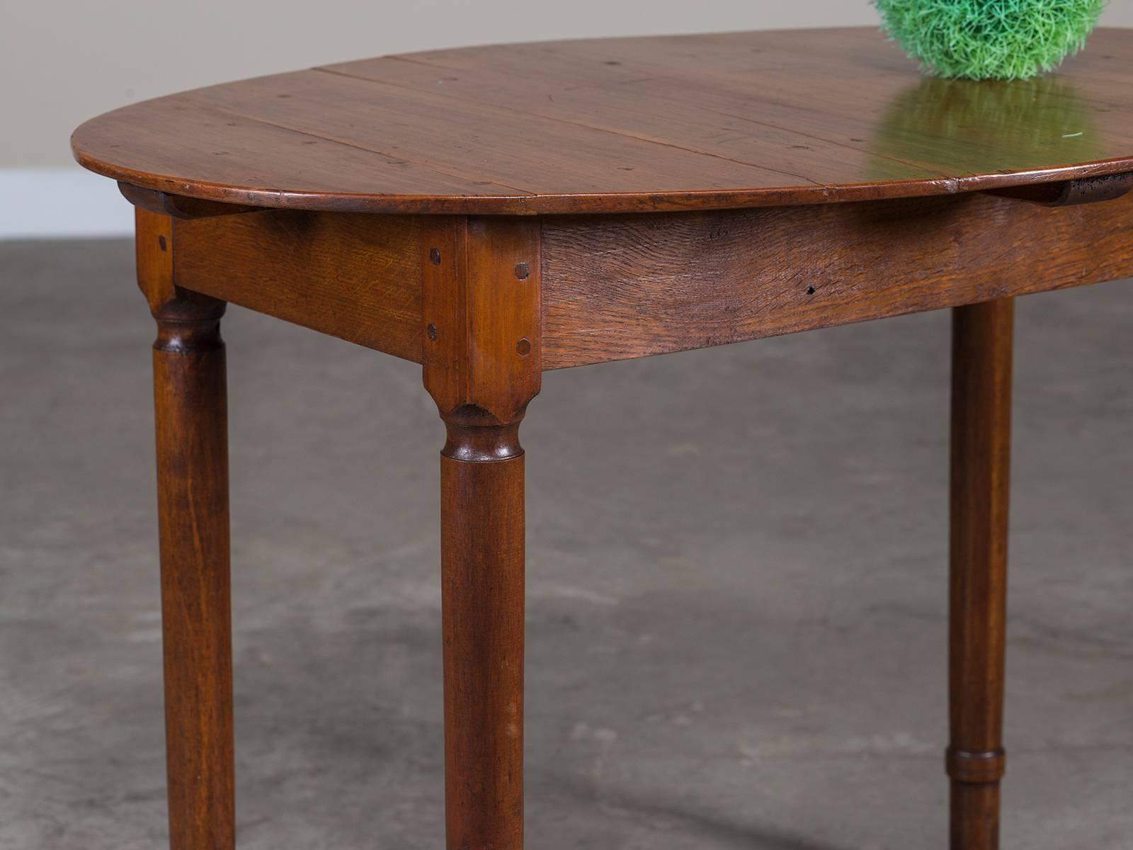 Cherry Antique French Restauration Louis Philippe Oval Top Table, circa 1830