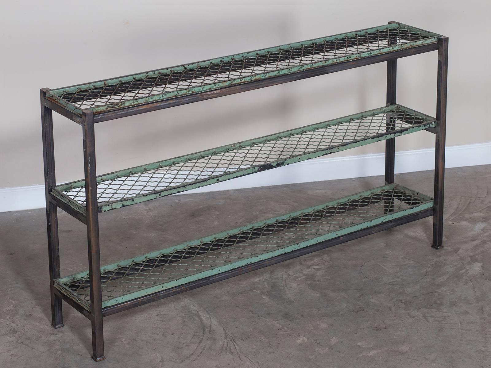 Receive our new selections direct from 1stdibs by email each week. Please click “Follow Dealer” button below and see them first!

A unique serving table display stand made of reclaimed vintage French painted metal shelves mounted on a custom steel
