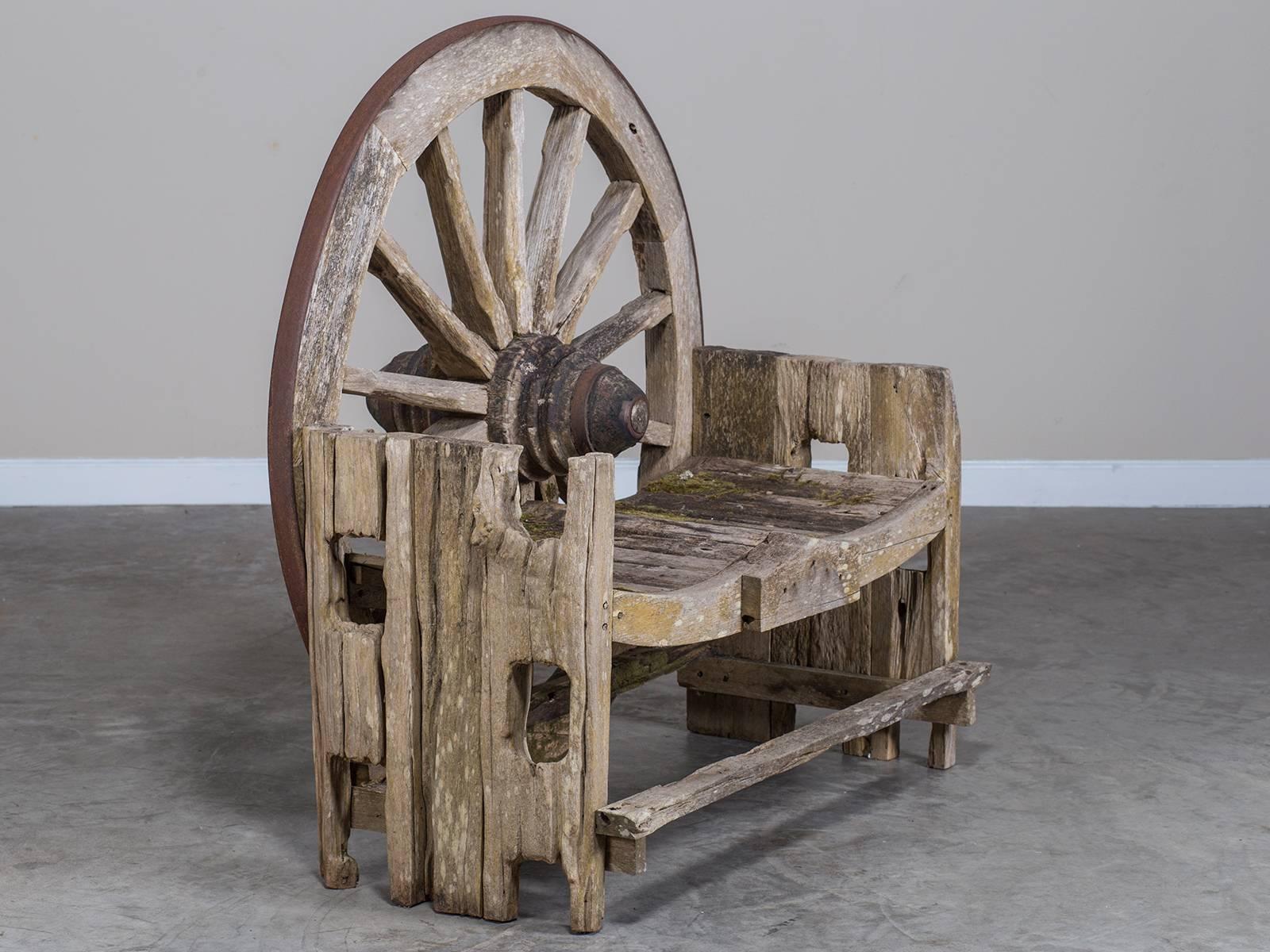 Receive our new selections direct from 1stdibs by email each week. Please click on “Follow Dealer” button below and see them first!

This quirky garden bench was originally in the French region of the Tarn where its distinctive wagon wheel back