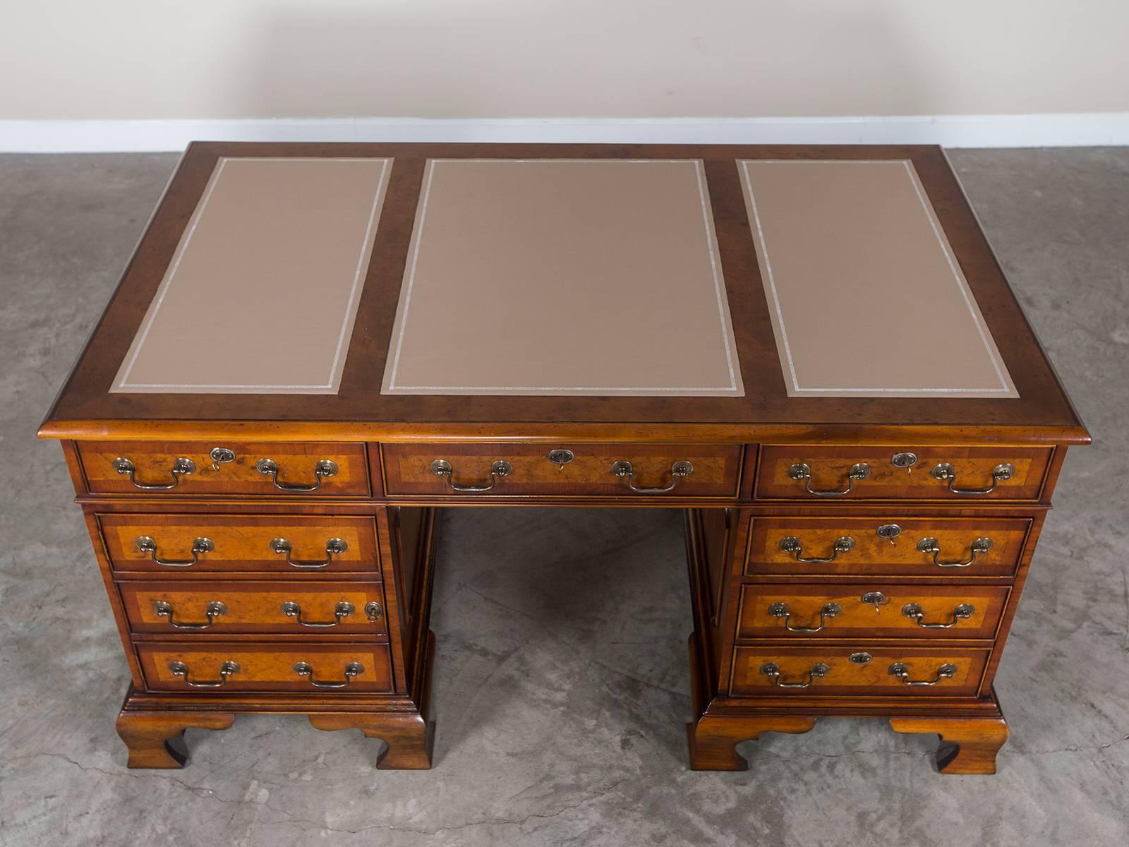 Receive our new selections direct from 1stdibs by email each week. Please click on “Follow Dealer” button below and see them first!

This handsome bespoke burl walnut partner's desk is hand made in England in the George III style with drawers and