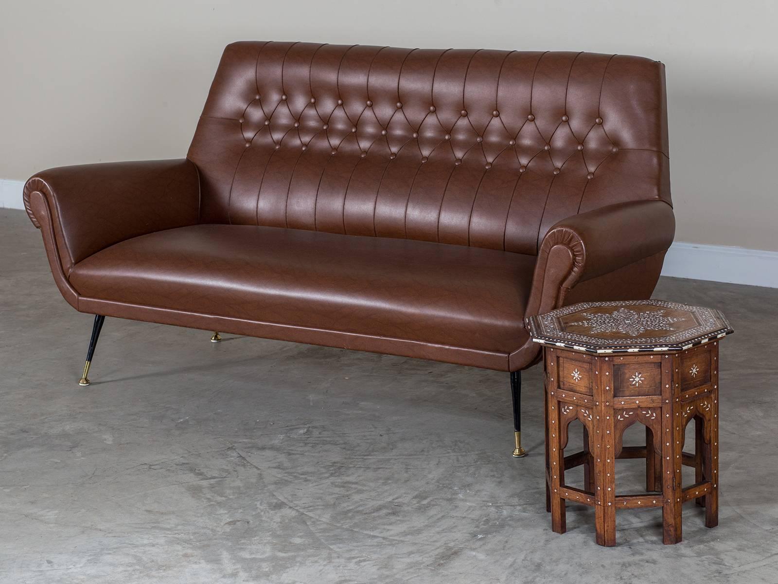 Receive our new selections direct from 1stdibs by email each week. Please click Follow Dealer below and see them first!

The stylish profile of this sofa is immediately identifiable as Italian in origin. Beginning in 1945 the Italian company