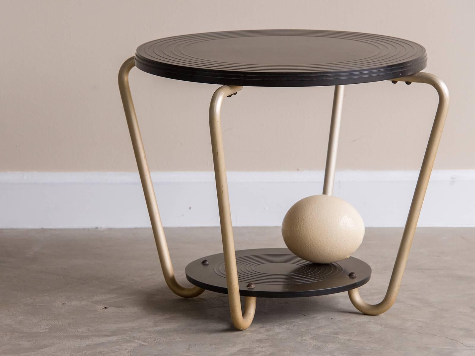 Receive our new selections direct from 1stdibs by email each week. Please click on “Follow Dealer” button below and see them first!

The circular top of this vintage French Mid-Century table, circa 1940 is made of the revolutionary material bakelite