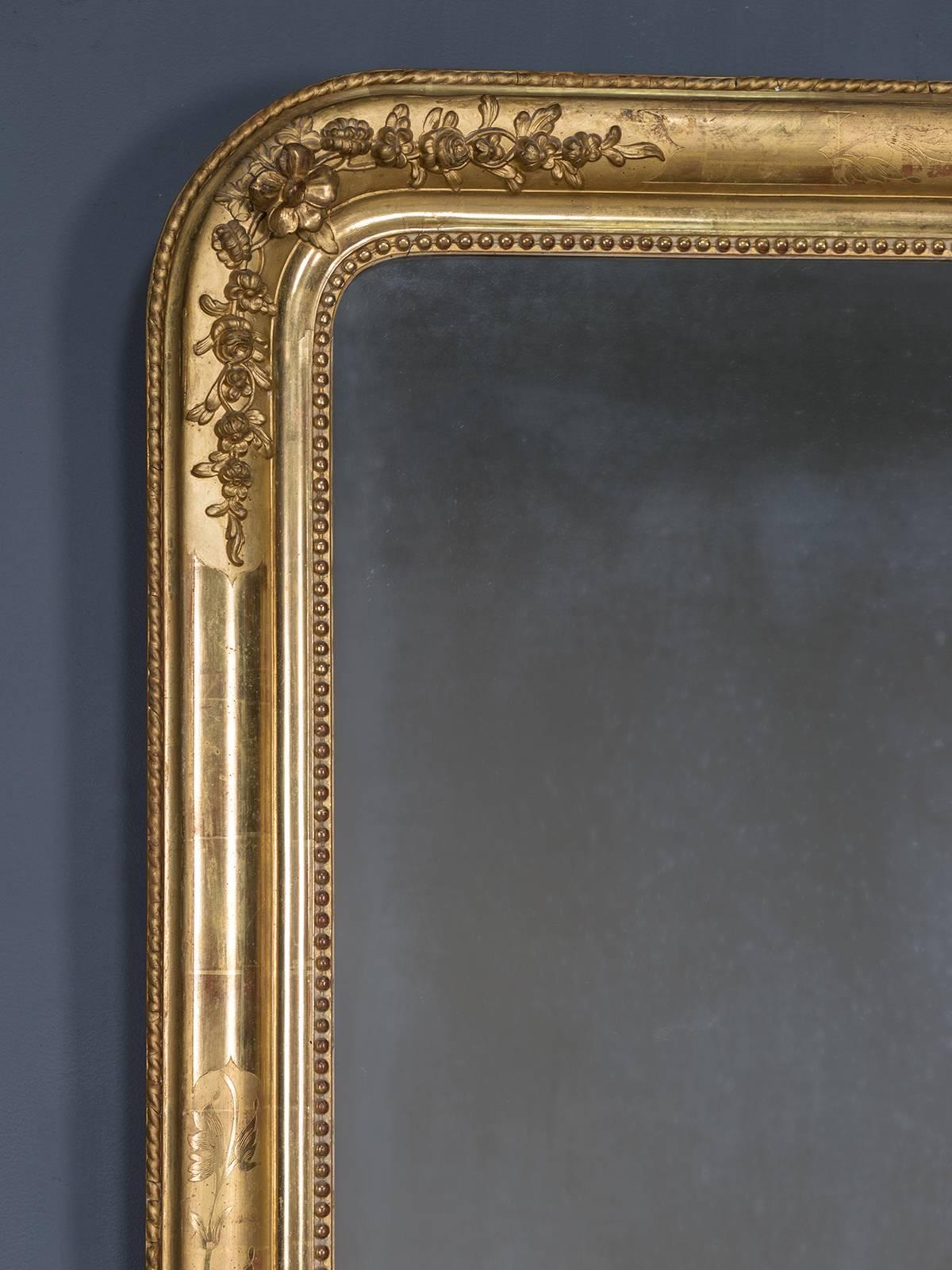 Receive our new selections direct from 1stdibs by email each week. Please click on “Follow Dealer” button below and see them first!

The elegant decoration on this antique French mirror circa 1880 is placed in a symmetrical manner with both raised