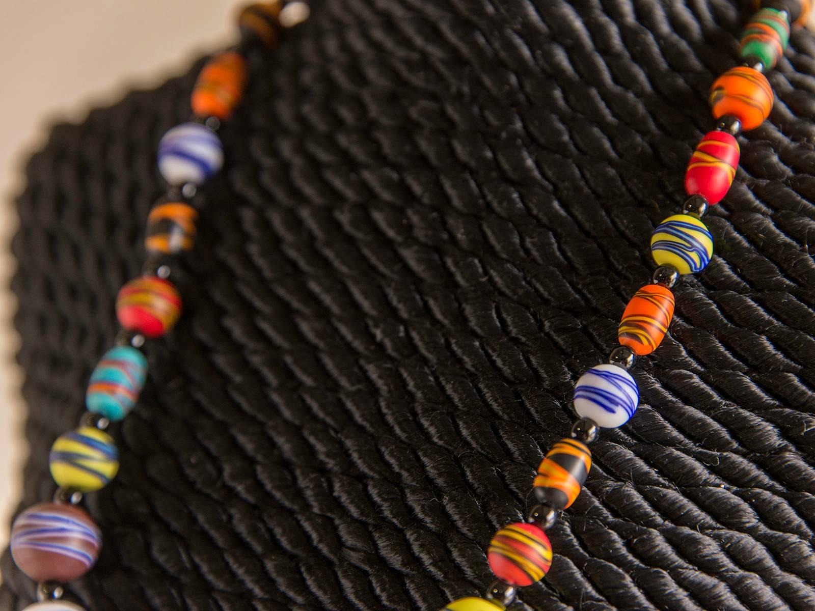 Receive our new selections direct from 1stdibs by email each week. Please click Follow Dealer below and see them first!

This example of contemporary Italian jewelry features a variety of translucent beads each striped in a contrasting pattern of