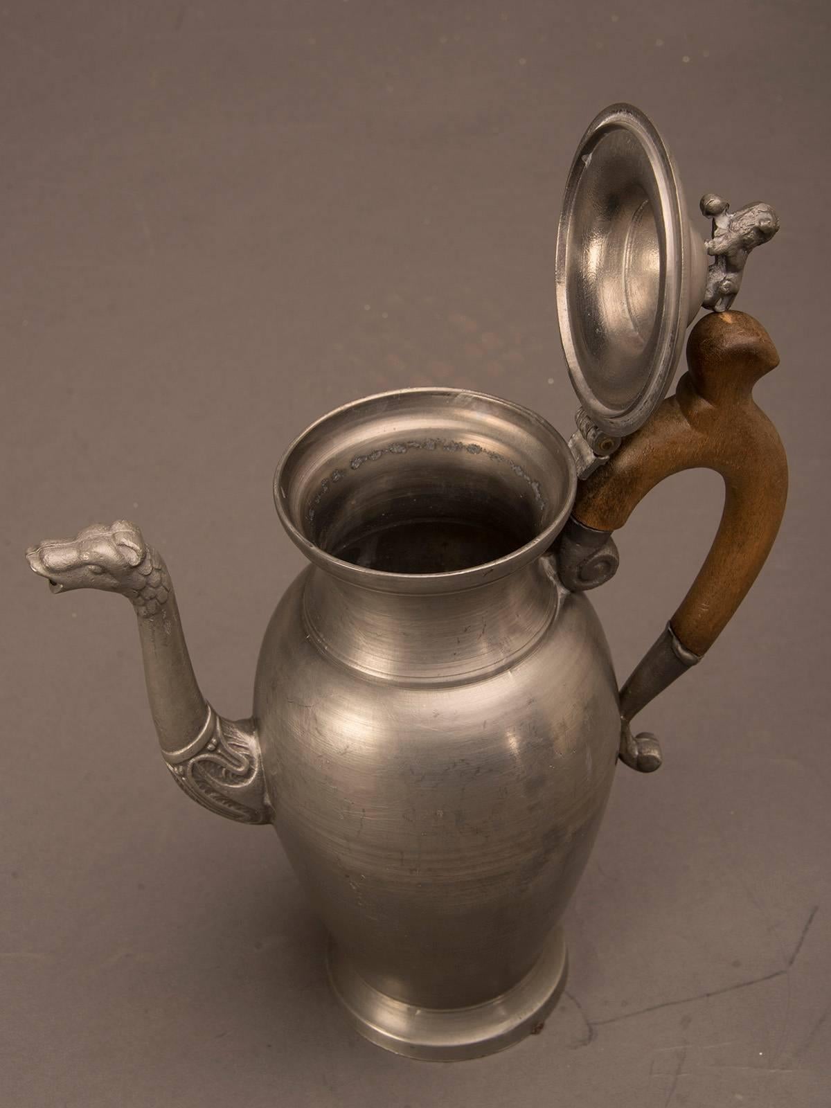 Receive our new selections direct from 1stdibs by email each week. Please click Follow Dealer below and see them first!

Large German pewter coffee pot, circa 1900 with original wooden handle. The distinctive shape of the body identifies these as