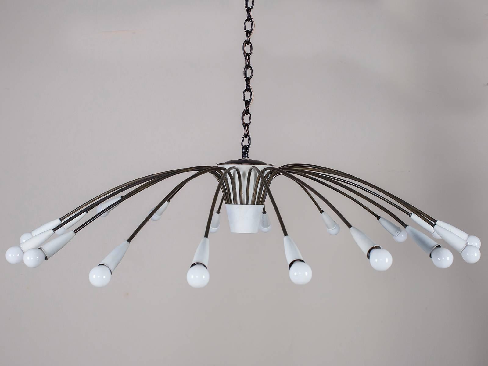 Receive our new selections direct from 1stdibs by email each week. Please click follow dealer below and see them first!

This Mid-Century Modern eight-light chandelier, circa 1960 is in the style of Stilnovo from Italy with its wide diameter but