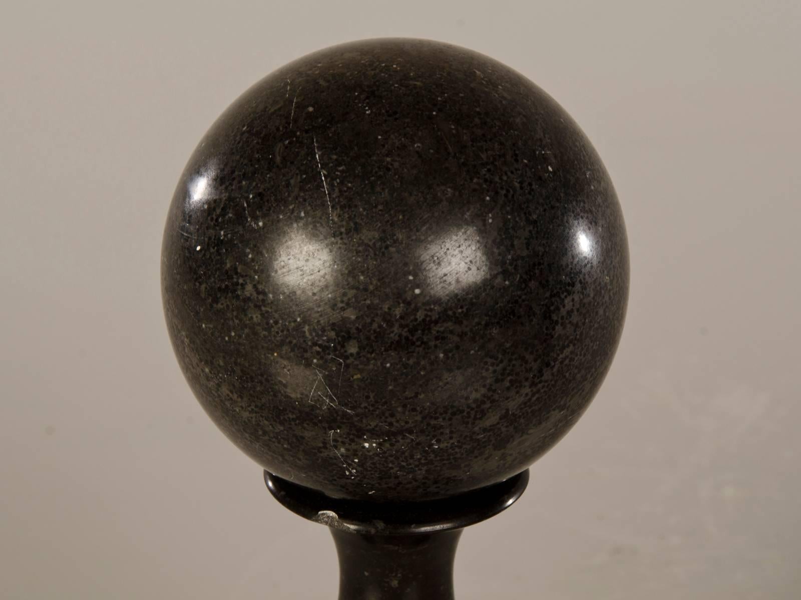 Carved Pair of Antique Italian Black Marble Spheres Atop Baluster Columns, circa 1890