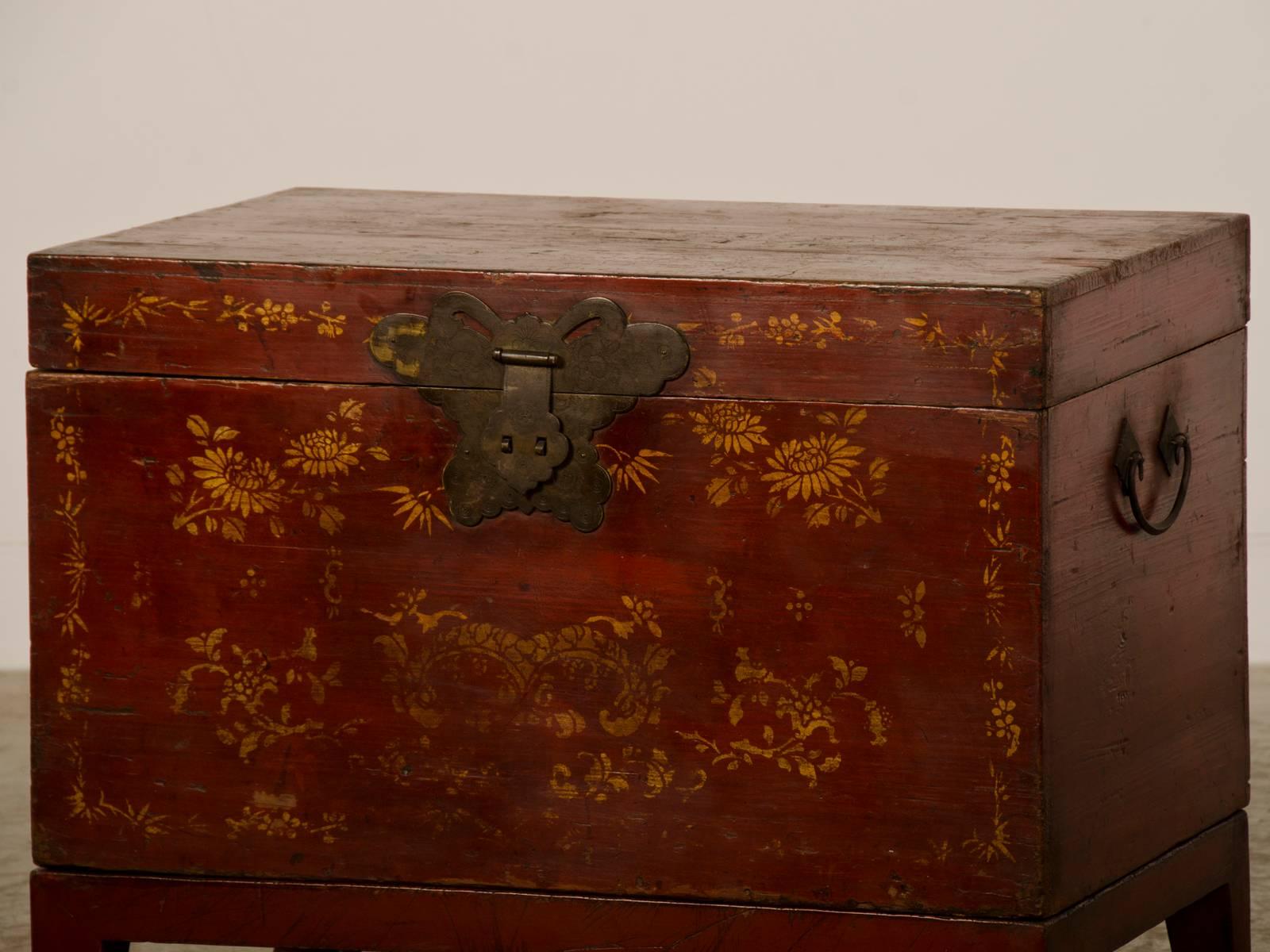 Receive our new selections direct from 1stdibs by email each week. Please click follow dealer below and see them first!

A red lacquer antique Chinese trunk with gold painted decoration from Kuang Hsu period circa 1875 now raised on a custom