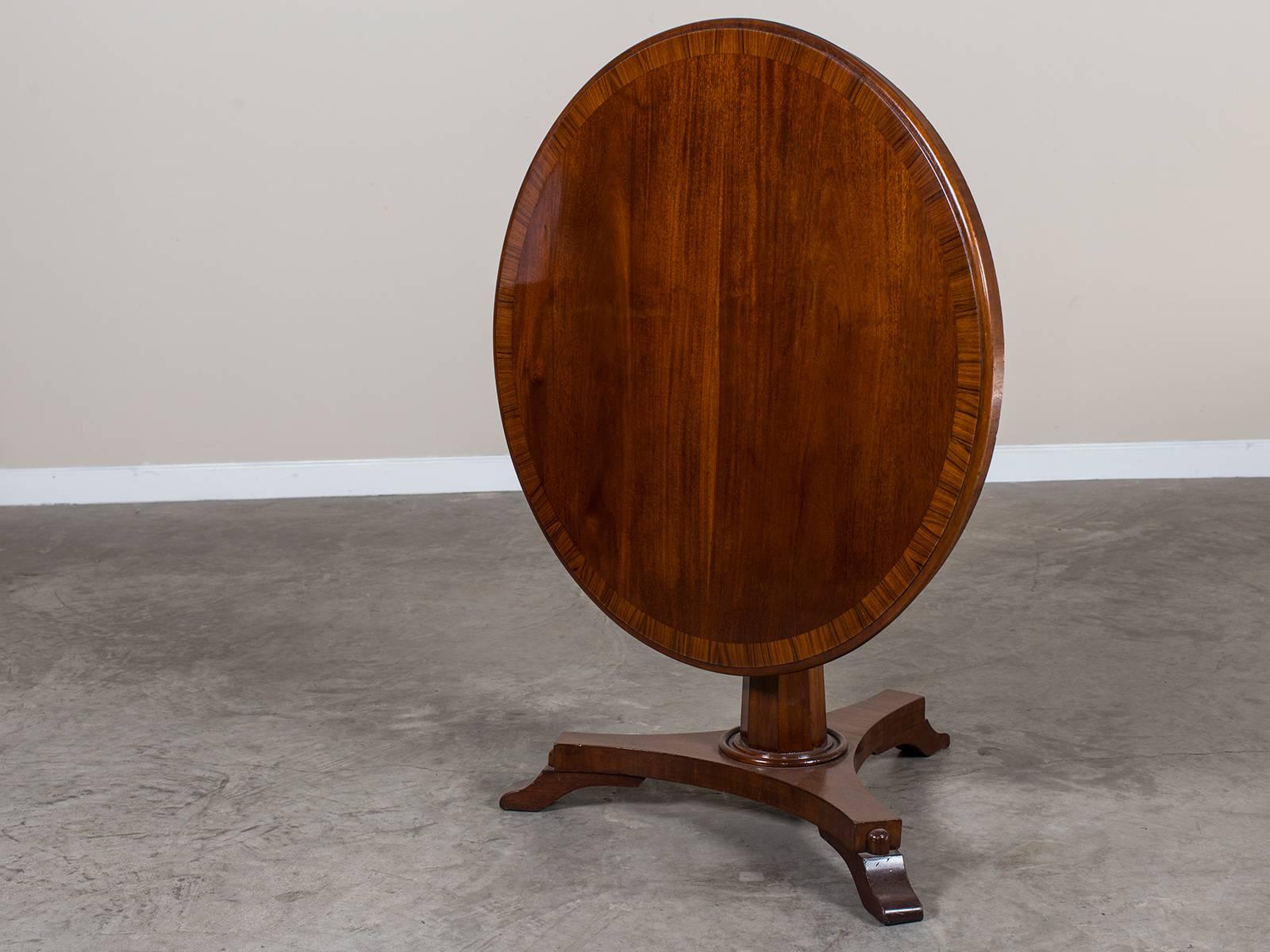Receive our new selections direct from 1stdibs by email each week. Please click follow dealer below and see them first!

The elegant slender lines of this antique English William IV period mahogany table, circa 1840 give it a versatility for use