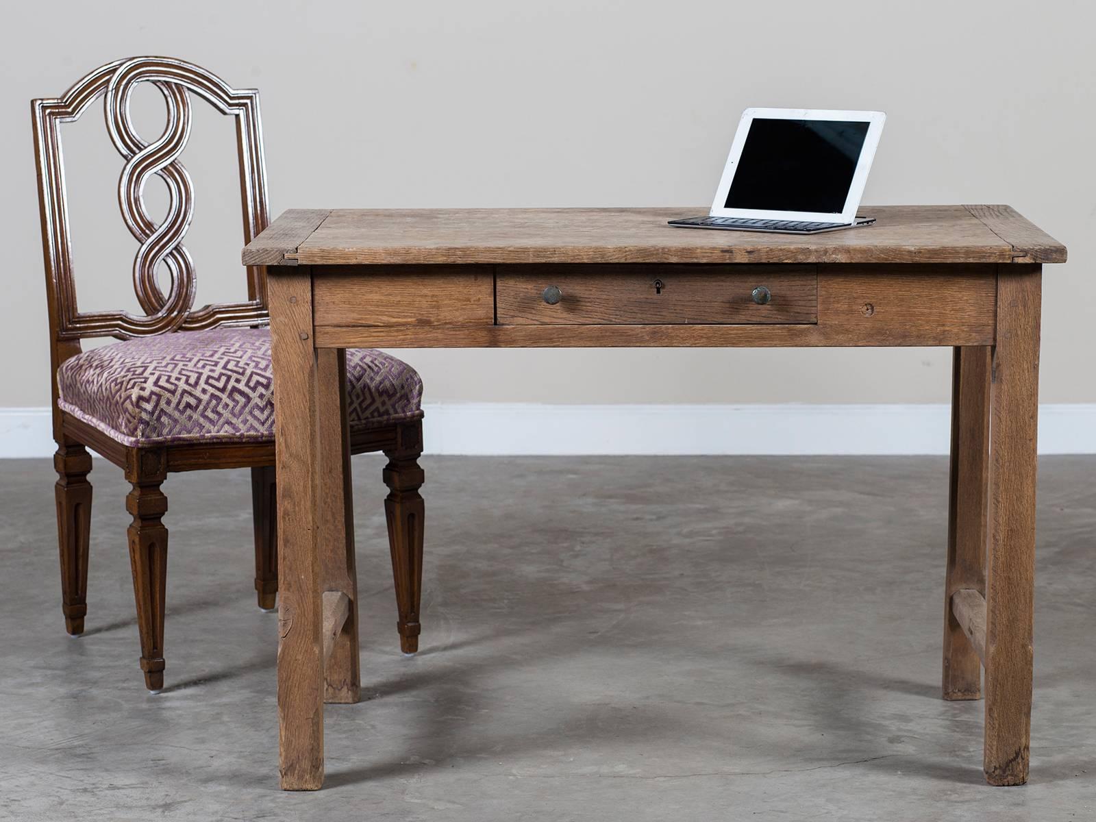 Receive our new selections direct from 1stdibs by email each week. Please click follow dealer below and see them first! 

The wonderful rustic quality of this antique French oak table constructed during the Louis Philippe period circa 1850 is