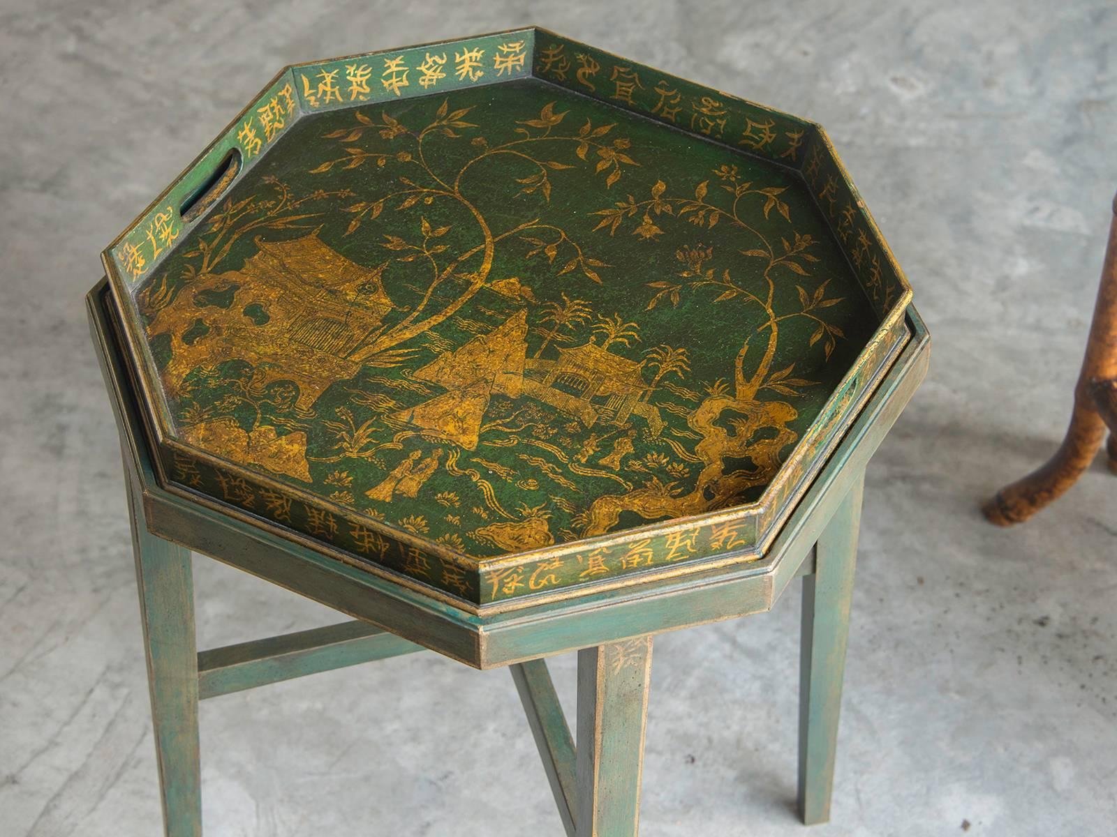 Be the first to see our new selections direct from 1stdibs! Please click on follow below. 

A rare and unique painted wood antique English tray coffee table of octagon shape embellished with a different gilded chinoiserie design from the Edwardian