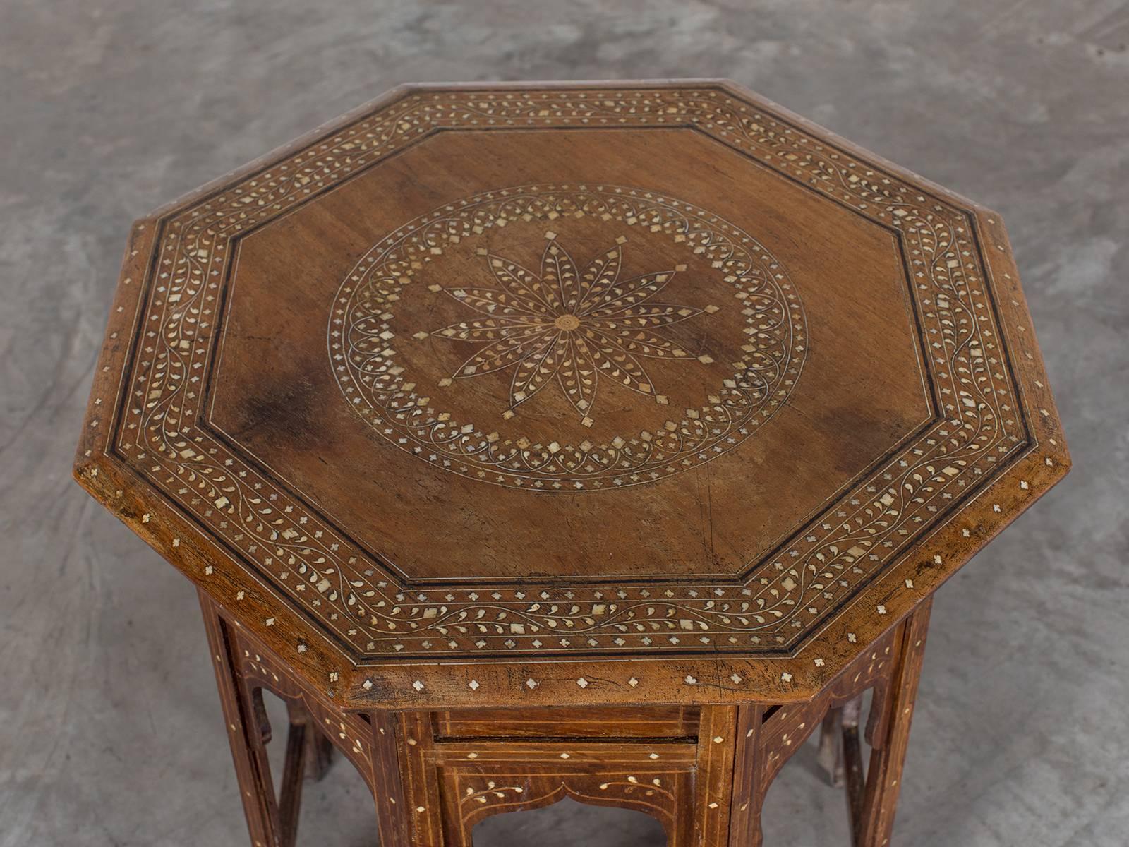 Be the first to see our new listings direct from 1stdibs! Please click "Follow" below.

A handsome Orientalist octagonal inlaid walnut table circa 1890. Turkish in inspiration, octagonal tables of this form were made in several parts of