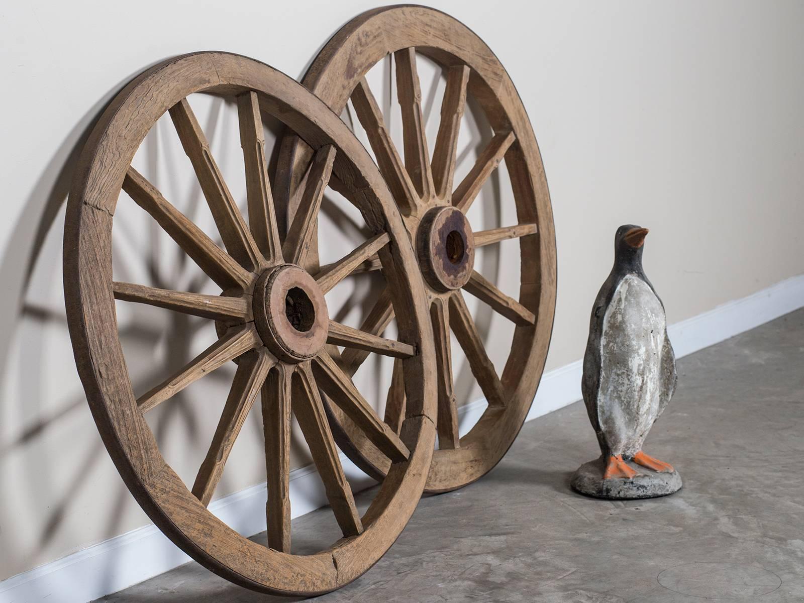Pair of Antique French Iron Bound Wagon Wheels, circa 1880 In Excellent Condition In Houston, TX