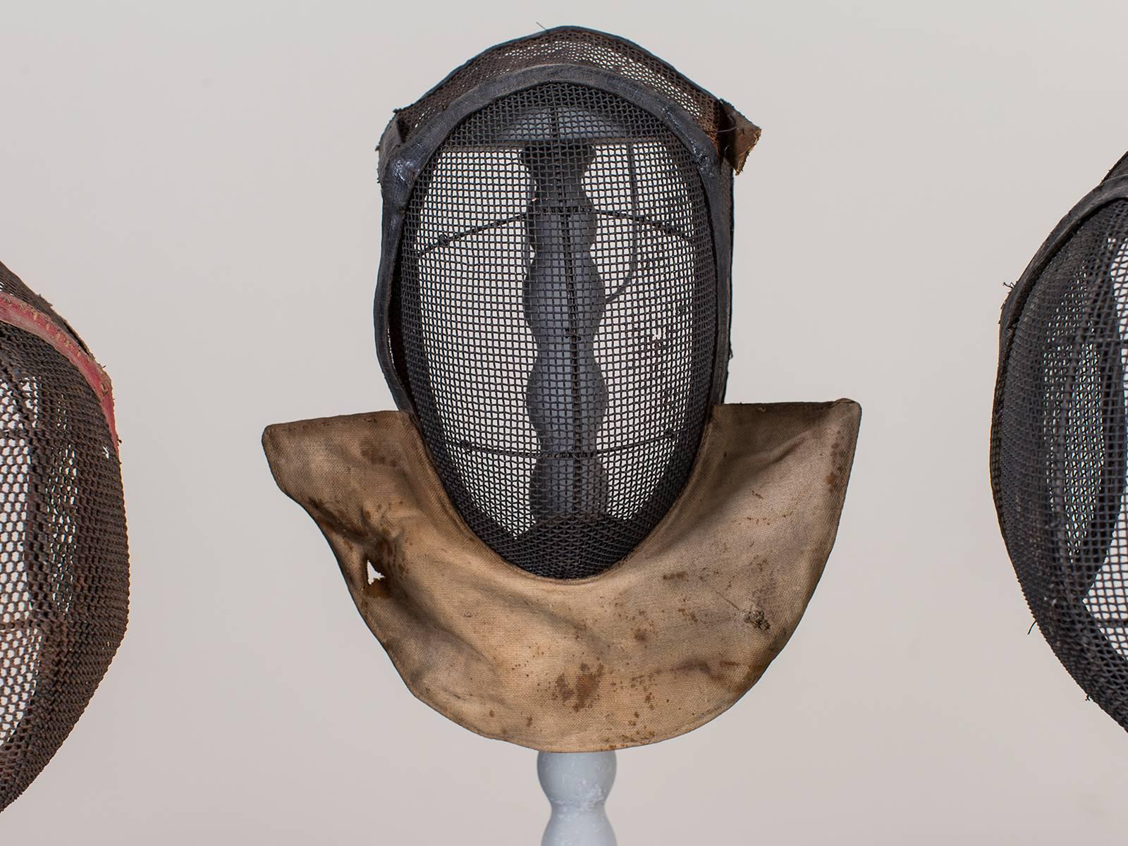 Early 20th Century Set of Three Antique French Fencing Masks, circa 1910 Each on a Stand