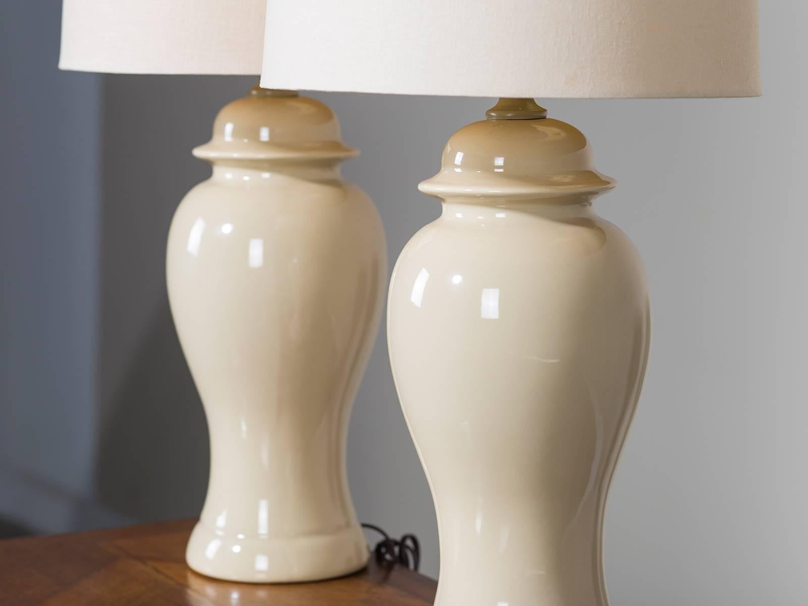 Chinese Export Pair of Taupe Chinese Ceramic Temple Jars Mounted as Lamps, circa 1995 For Sale