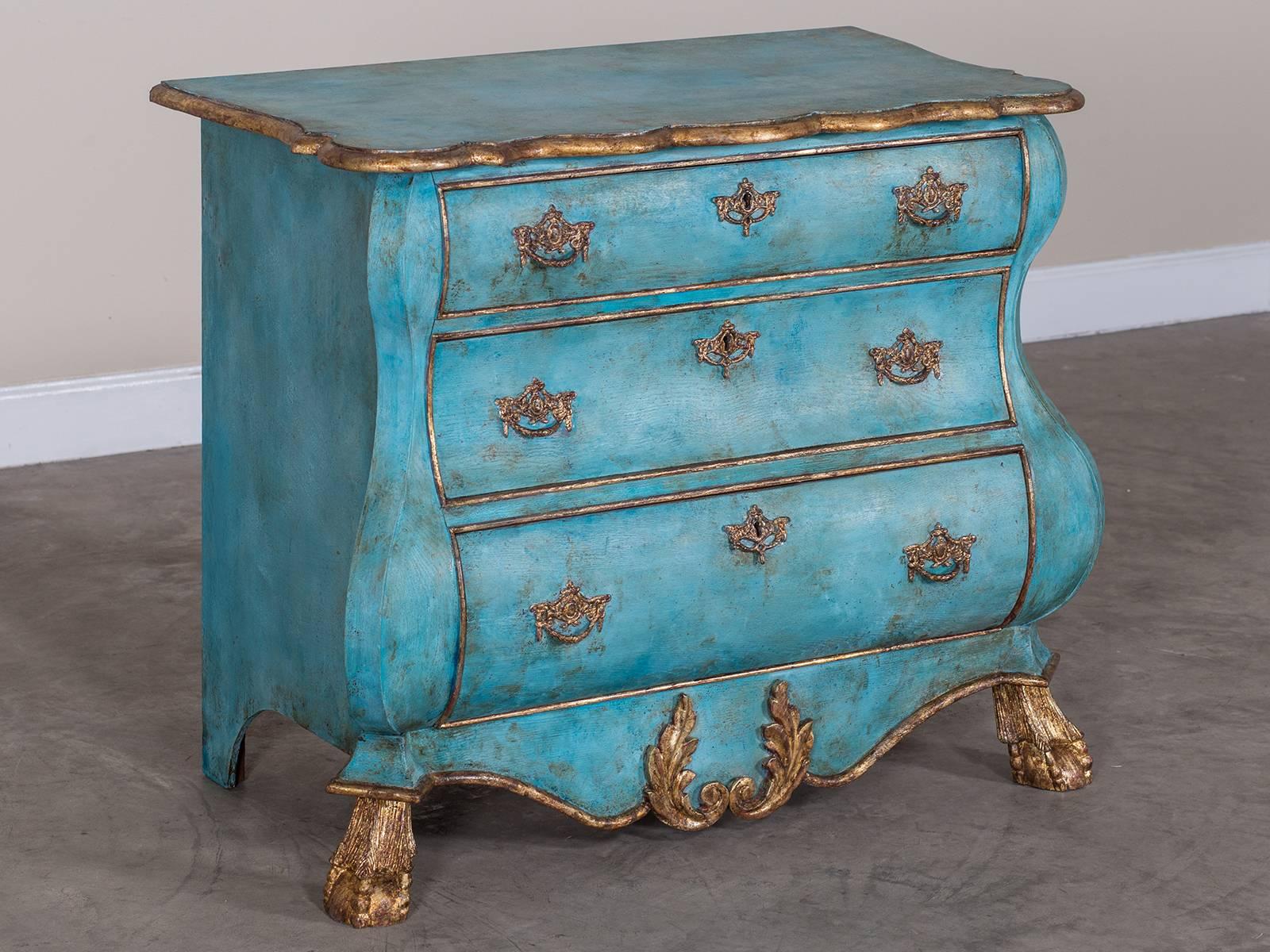 Be the first to see our new arrivals directly through 1stdibs! Please click follow dealer below.

A beautifully sculptural antique Dutch painted and gilded bombé commode (chest of drawers) from Holland, circa 1850. Please notice the elegant shaped