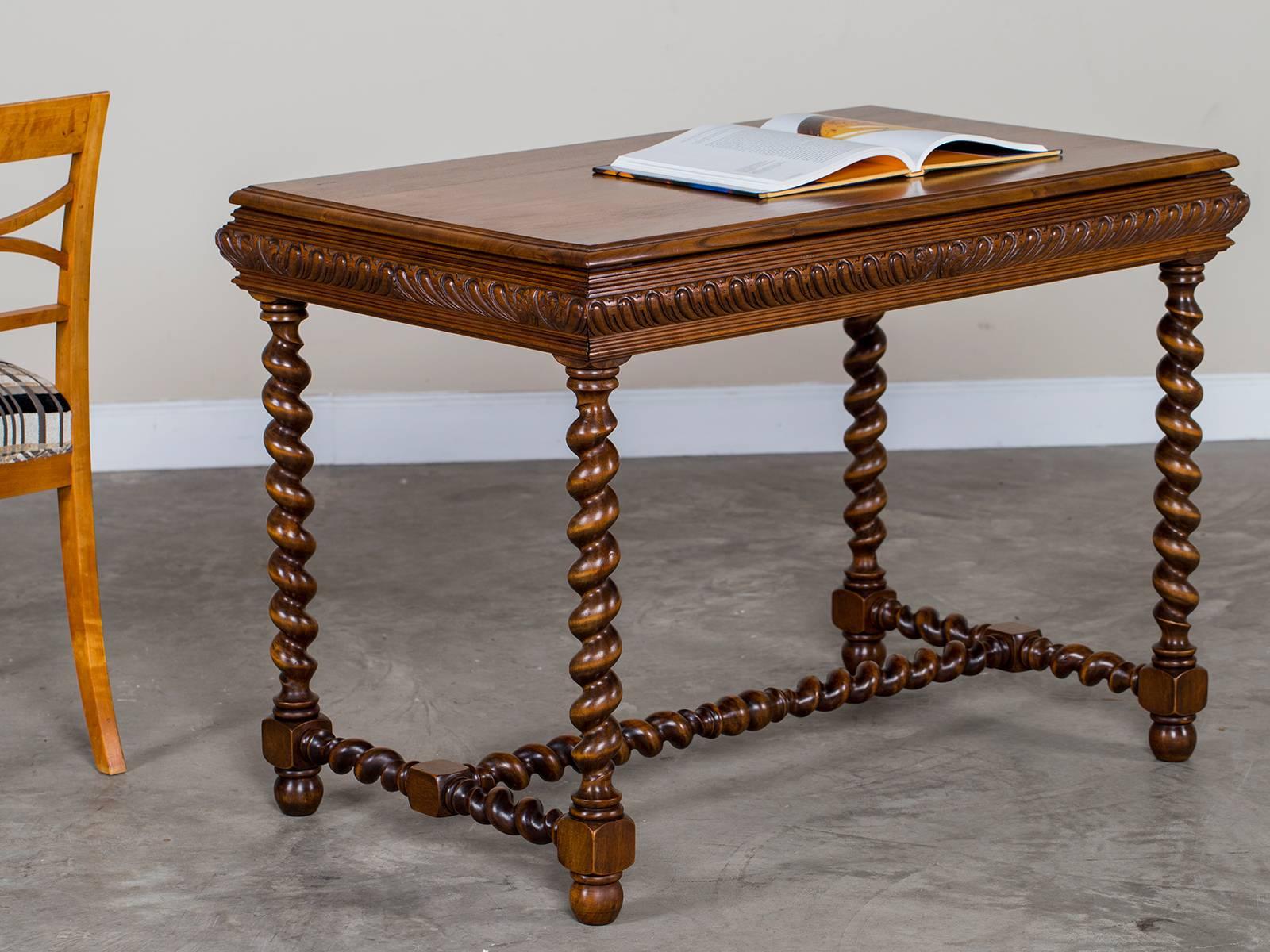Be the first to see our new arrivals directly through 1stdibs! Please click follow dealer below. 

The beautifully restrained carving seen on this vintage French walnut table circa 1920 extends along all four sides making it ideal to use in the