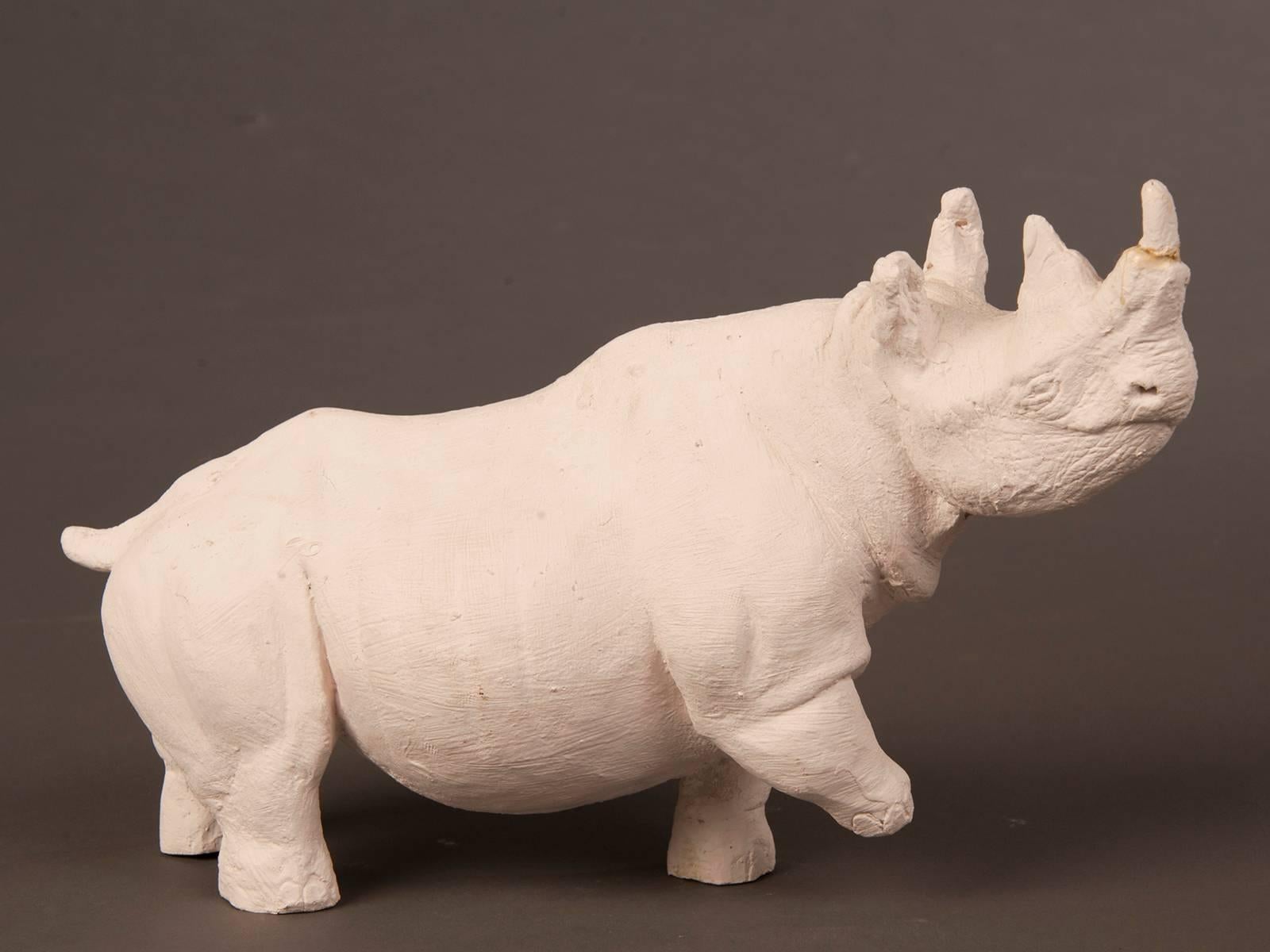 Be the first to see our new arrivals directly through 1stdibs! Please click follow dealer below. 

A Vintage standing rhinoceros plaster maquette figure from a private collection in France, circa 1960.
       