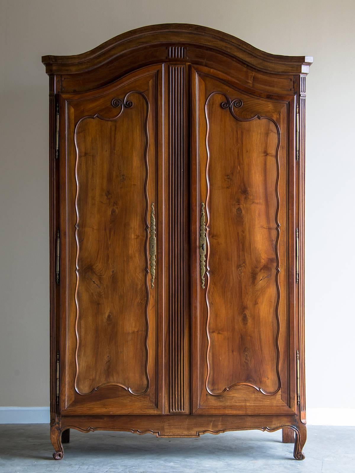 Receive our new selections direct from 1stdibs by email each week. Please click Follow Dealer below and see them first!

Louis XV style antique French cherrywood armoire from Normandy, France circa 1785.