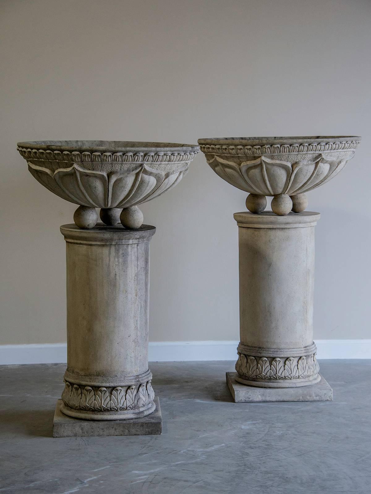 Receive our new selections direct from 1stdibs by email each week. Please click Follow Dealer below and see them first!

Pair of vintage French circular basins atop columns with relief decoration. These grand scale architecturally inaspired garden