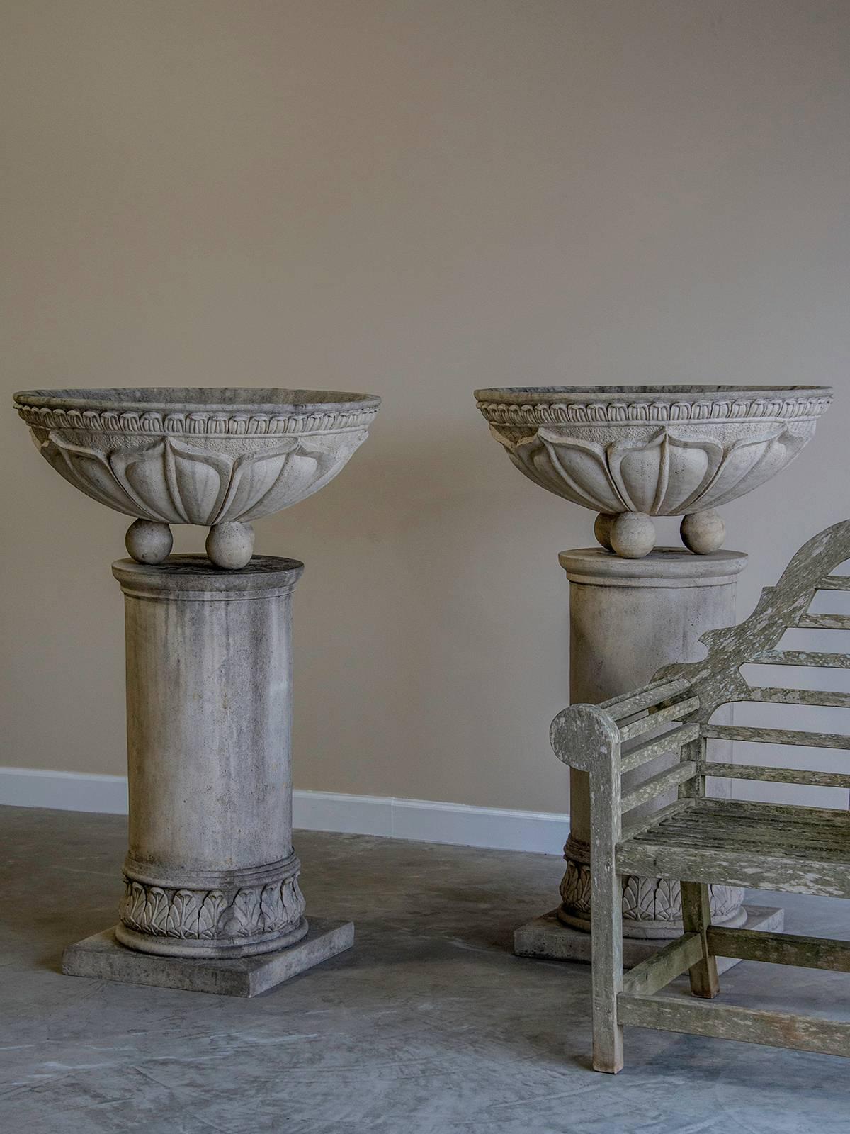 Pair of Vintage French Circular Basins Atop Columns, Relief Decoration In Excellent Condition In Houston, TX