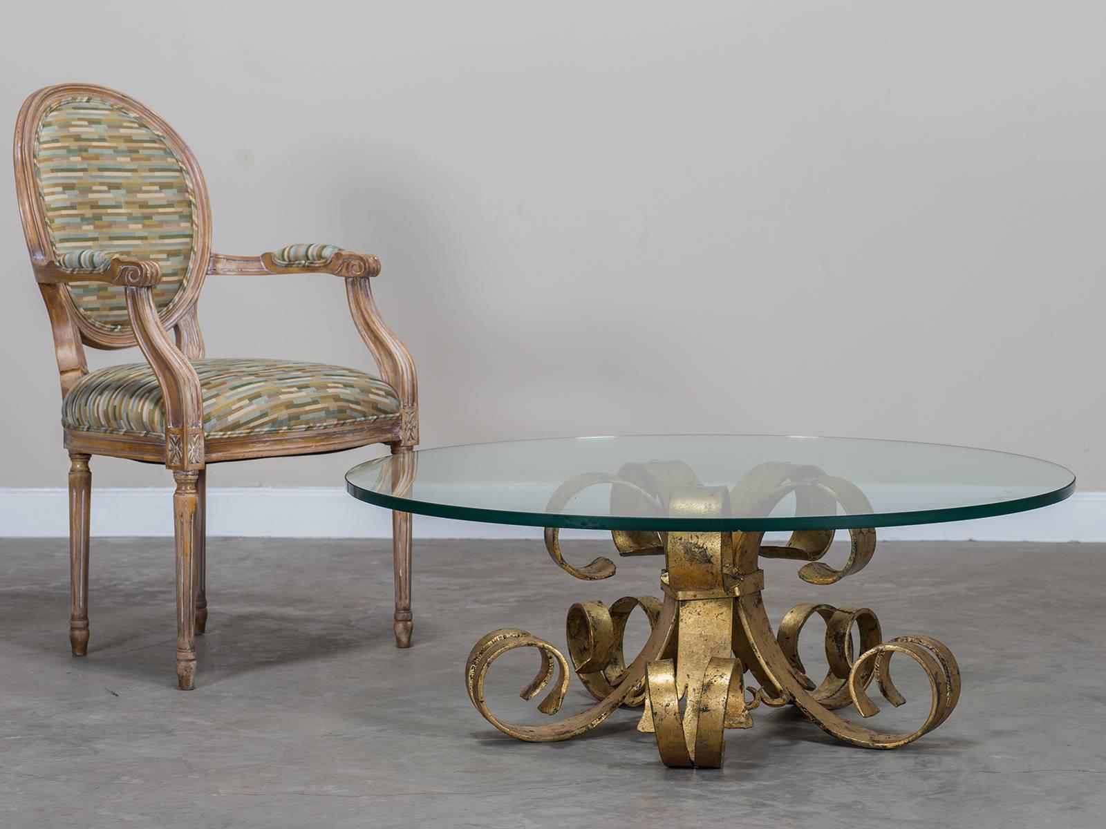 Receive our new selections direct from 1stdibs by email each week. Please click Follow Dealer below and see them first!

The extravagant flared shape of this vintage French cocktail table circa 1920 makes a powerful visual statement. Five iron