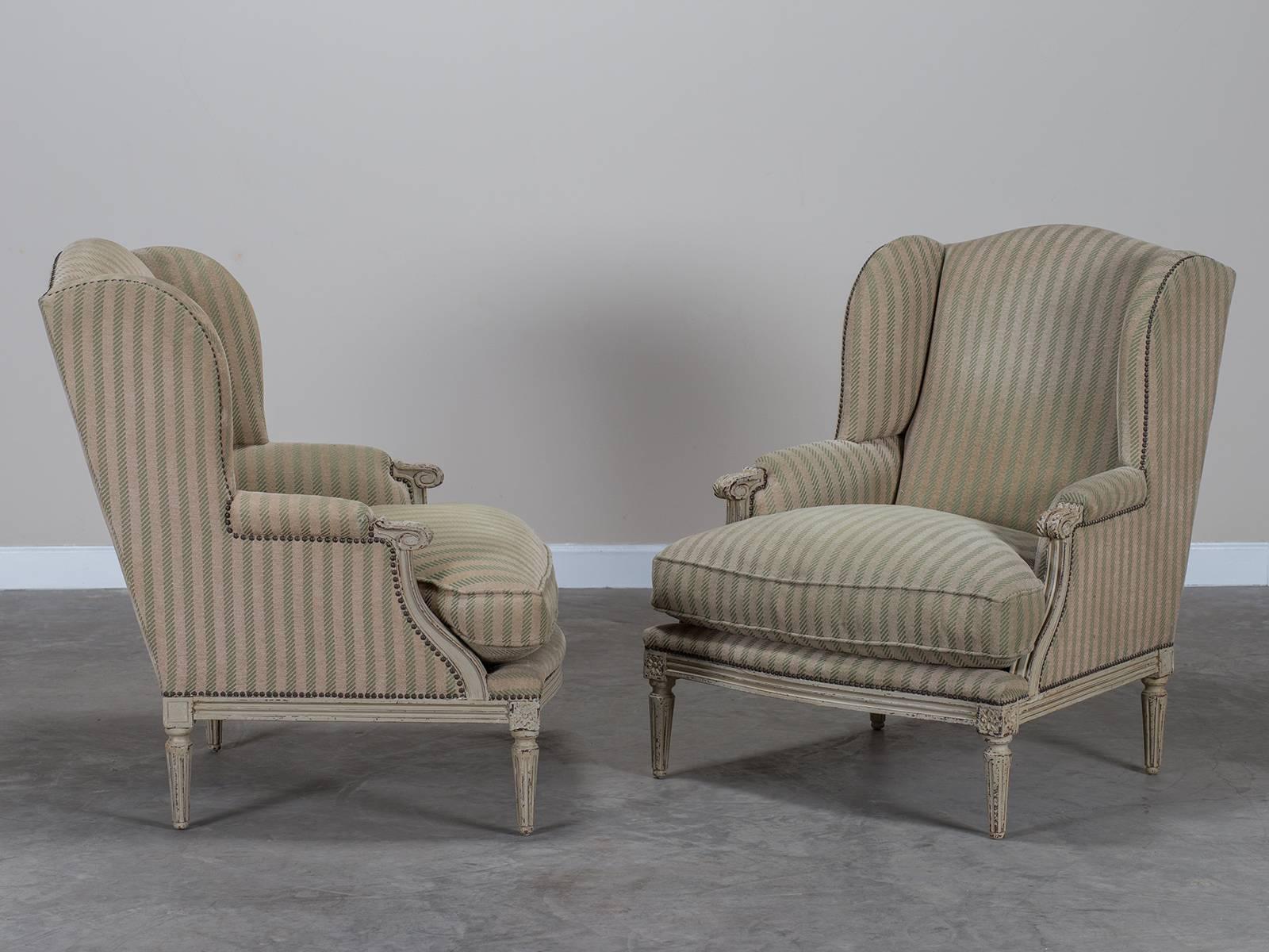 The grand scale of this pair of Louis XVI style French bergeres makes them supremely comfortable. The slant of the back and the depth and width of the seat are generous in proportion and well cushioned. Originally known as 