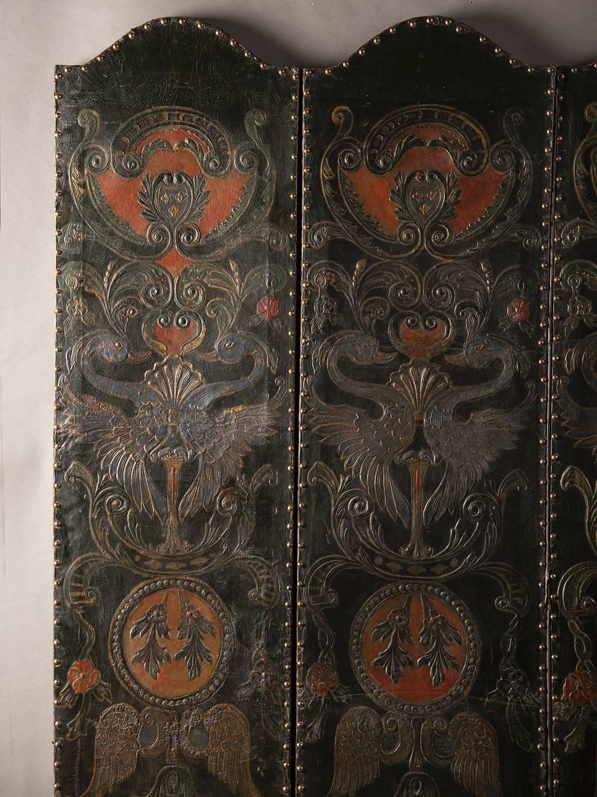 Receive our new selections direct from 1stdibs by email each week. Please click Follow Dealer below and see them first!

An antique French embossed, painted and gold leaf leather screen with four panels circa 1840 of substantial size. This screen