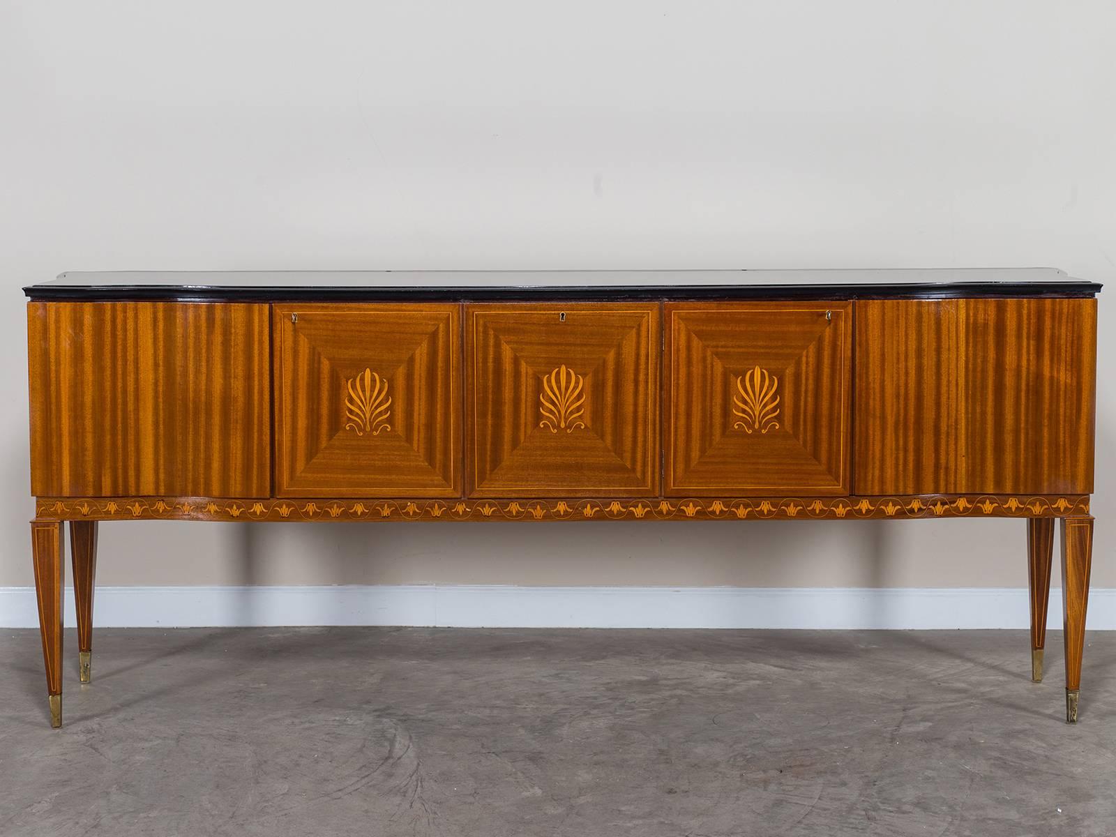 Receive our new selections direct from 1stdibs by email each week. Please click Follow Dealer below and see them first!

The striking design of this sideboard is attributed to the famous Italian designer Paolo Buffa. Known for his exotic and