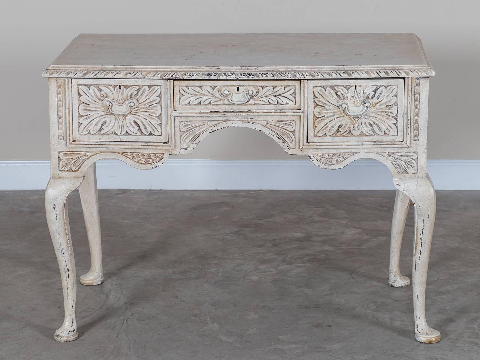 Receive our new selections direct from 1stdibs by email each week. Please click Follow Dealer below and see them first!

An antique English Queen Anne style painted oak lowboy circa 1850 used as a side table or console. This Classic piece of early
