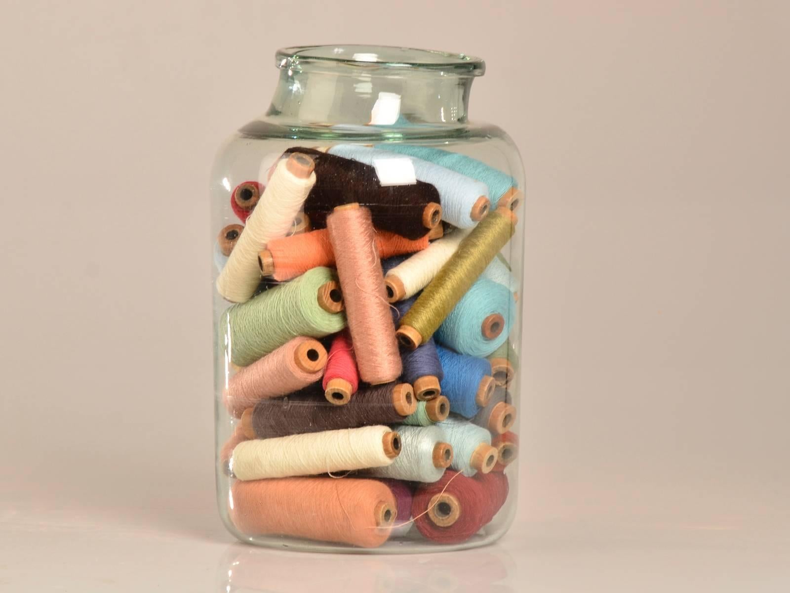 Receive our new selections direct from 1stdibs by email each week. Please click Follow Dealer below and see them first!

A wonderful hand blown glass bottle each filled with an assortment of bobbins of coloured thread rescued from a mill in Belgium