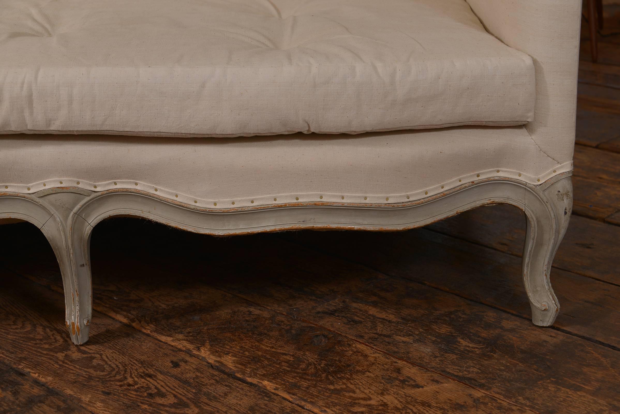 Late 19th century French Louis XVI style sofa with original paint finish.
 