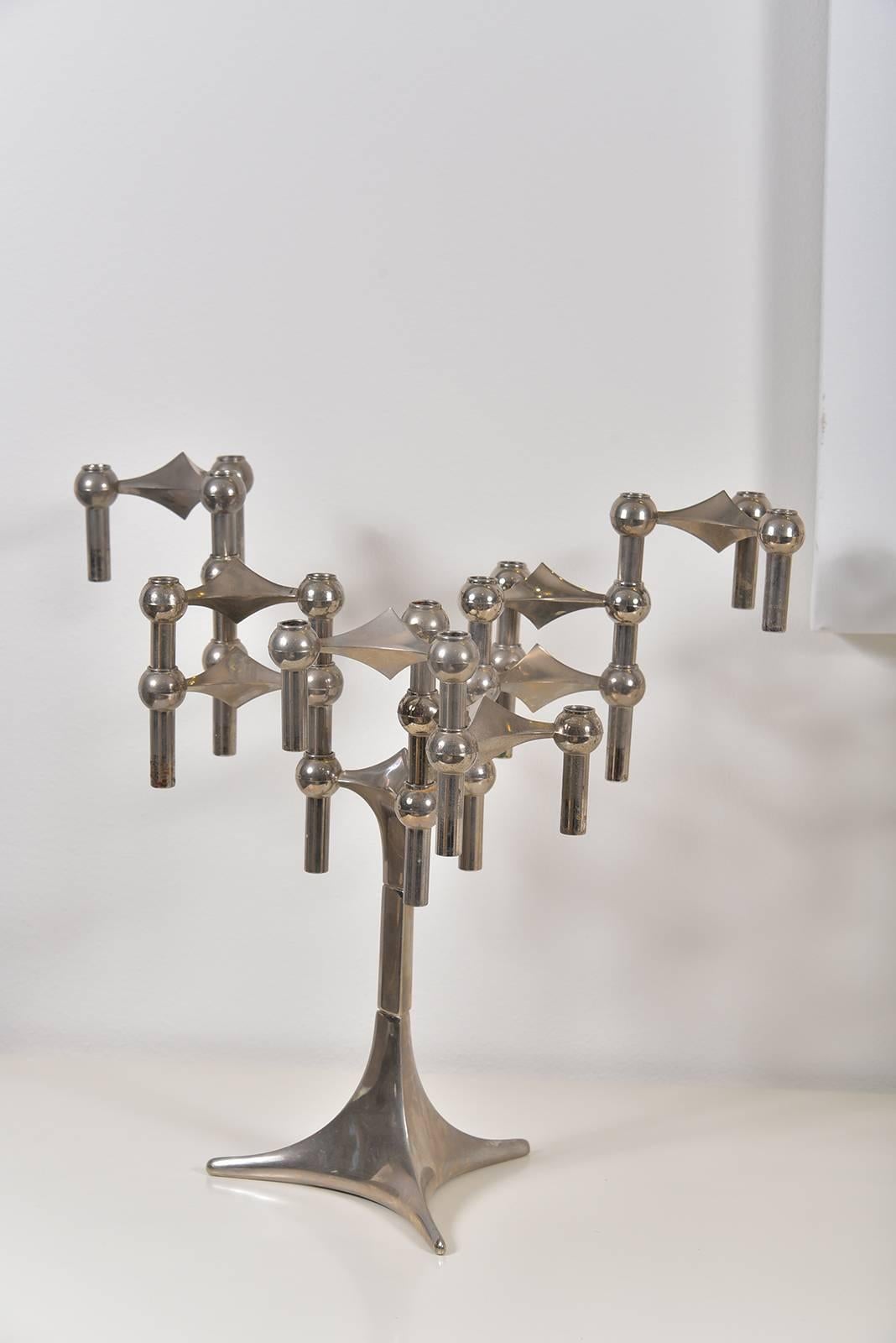 A beautiful pair of French, 1940s French silvered bronze candelabras. A modular design easily manipulated into many kinds of different configurations.