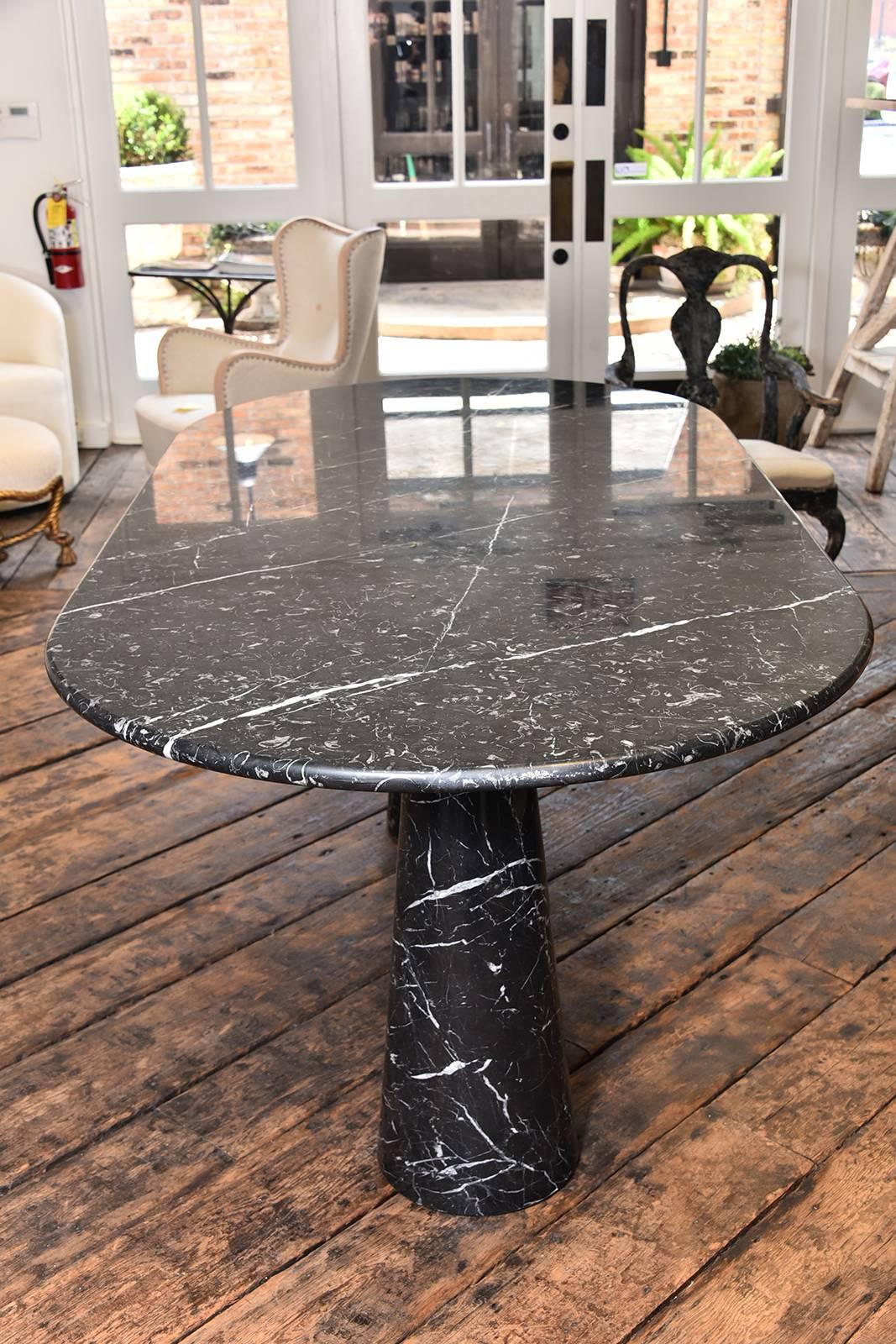 A vintage marble Angelo Mangiarotti double pedestal black marble table. It is very rare to find a double pedestal in this size and condition. Made sometime between the 1960s-1970s.