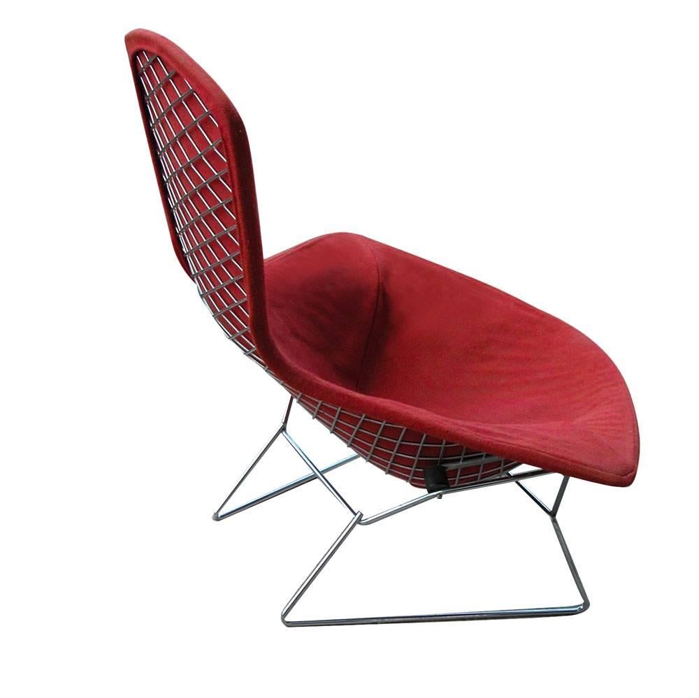 Bird chair designed by Harry Bertoia for Knoll,
 1952. 
Polished chrome steel upholstered in original red fabric.
Foam needs to be replaced.

