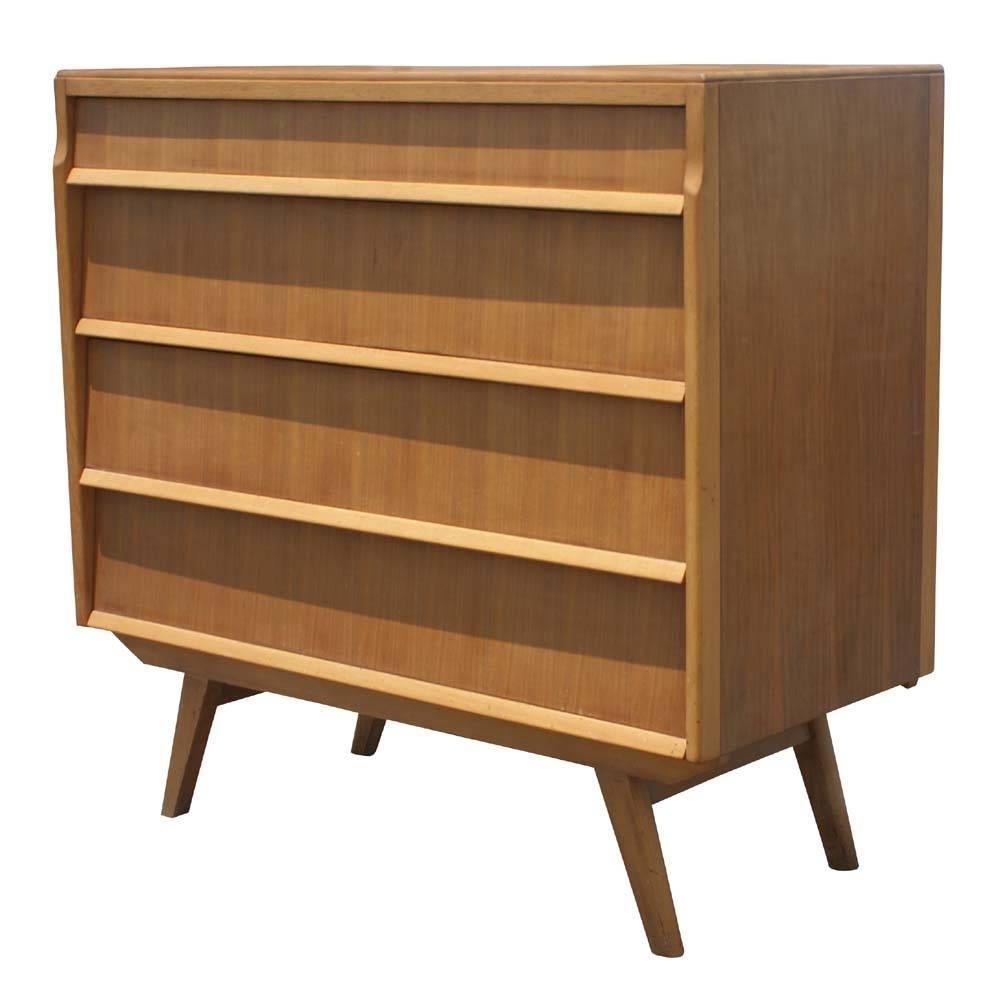 Four spacious drawers. 
Featuring splayed legs, two available, price per dresser.

Measures: 36