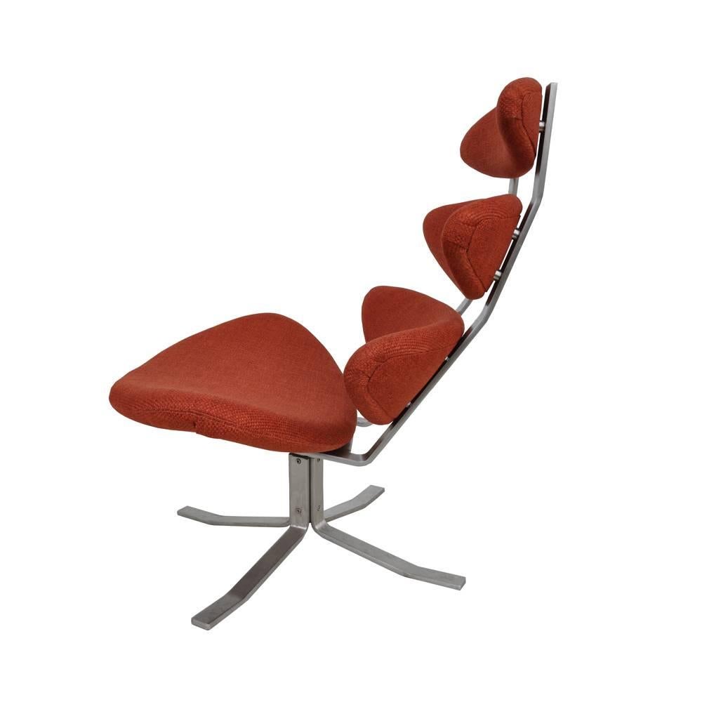 Corona chair by Poul M. Volther for Erik Jorgensen

 1964

 An iconic sculptural lounge chair inspired by human anatomy. Molded polyurethane foam on a sturdy polished chrome frame that swivels. Rich terra cotta tweed fabric,.
 