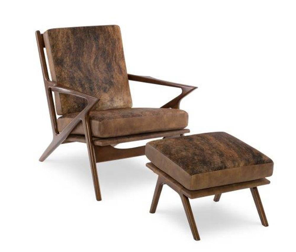 This famous Mid-Century chair comes in hair on hide seat tops and trimmed in supple leather back and sides with welt on all seams. This modern spin of a popular Mid-Century design can be upholstered in a variety of leathers and colors. European