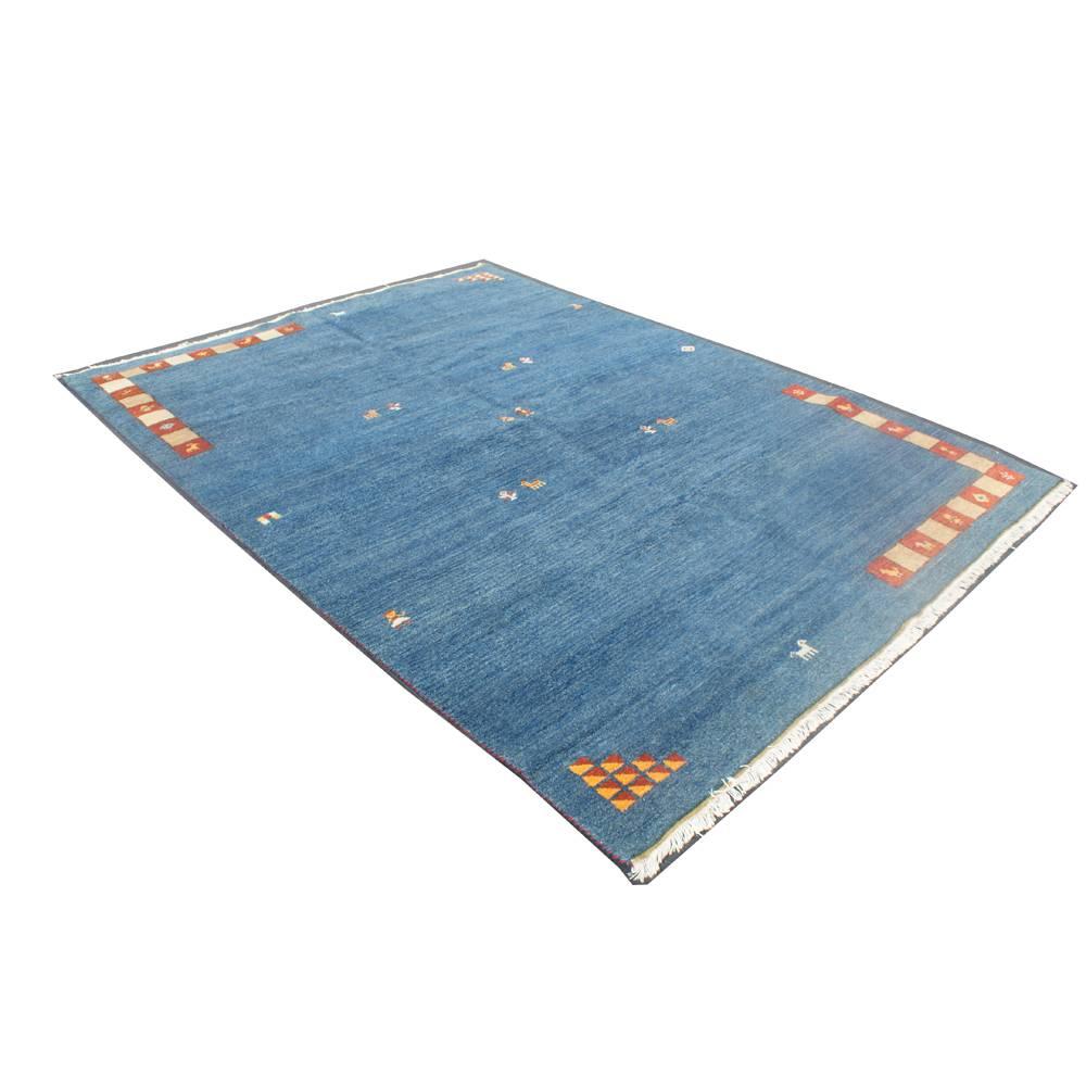 Color: Blue 
Material: 100% wool 
Origin: India. Measures: 99" x 136".