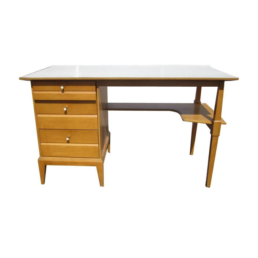 A 48" vintage Heywood-Wakefield M1106 Cadence desk vanity. 

This desk/vanity features a single pedestal design, stylish lower shelf and laminate top. A great example of Classic Heywood Wakefield style and substance. Very nice example of this