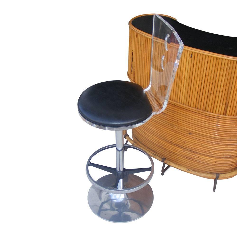 H Studios Haziza.

Three Modern lucite chrome and vinyl stools. 

 Swivels, on chrome base with lucite backs and vinyl seats. 

29.5 Seat Height

When shopping for stools:
Stools with a seat height of 28 to 33 inches work best 
with bar-height