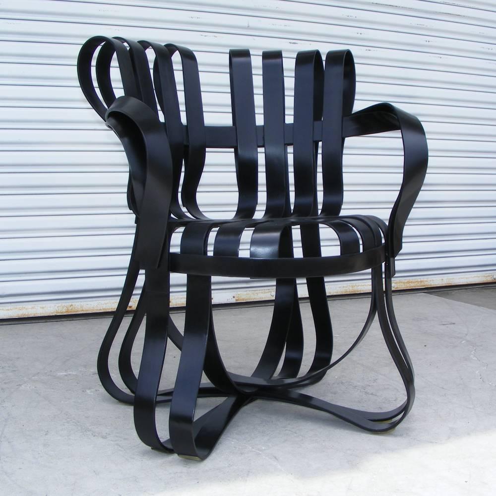 Knoll Frank Gehry Cross Check Armchair 
Time magazine Best Design of the Year 1992

Inspired apple crates he played on as a child, Frank Gehry created his thoroughly original collection of bentwood furniture. 
Ebonized molded frame.
Adhesives
