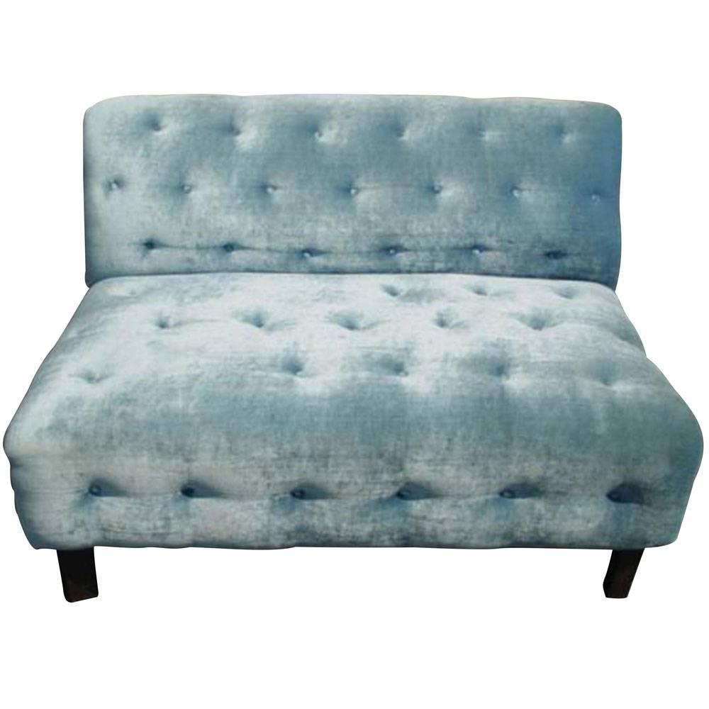 A vintage loveseat settee with original sky blue velvet upholstery. Classic lines with button tufting.

Reupholstery recommended.

