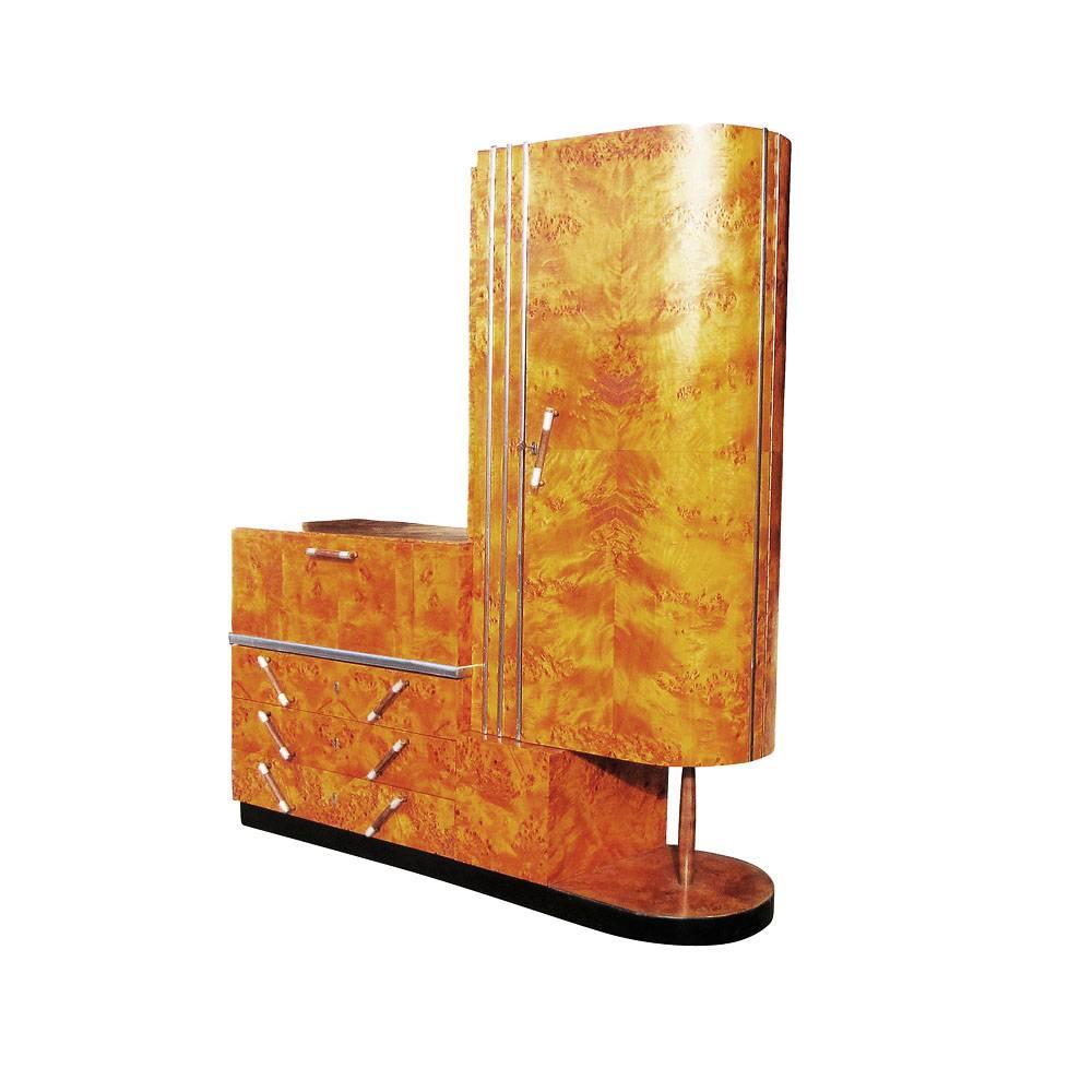 Vintage Italian Art Deco wardrobe by C-Bertero. This is a stunning Art Deco wardrobe, sophisticated in design and constructed of burl wood. A beautiful design for a modern home or living space.
Closet, three-drawer and pull down vanity.
Also