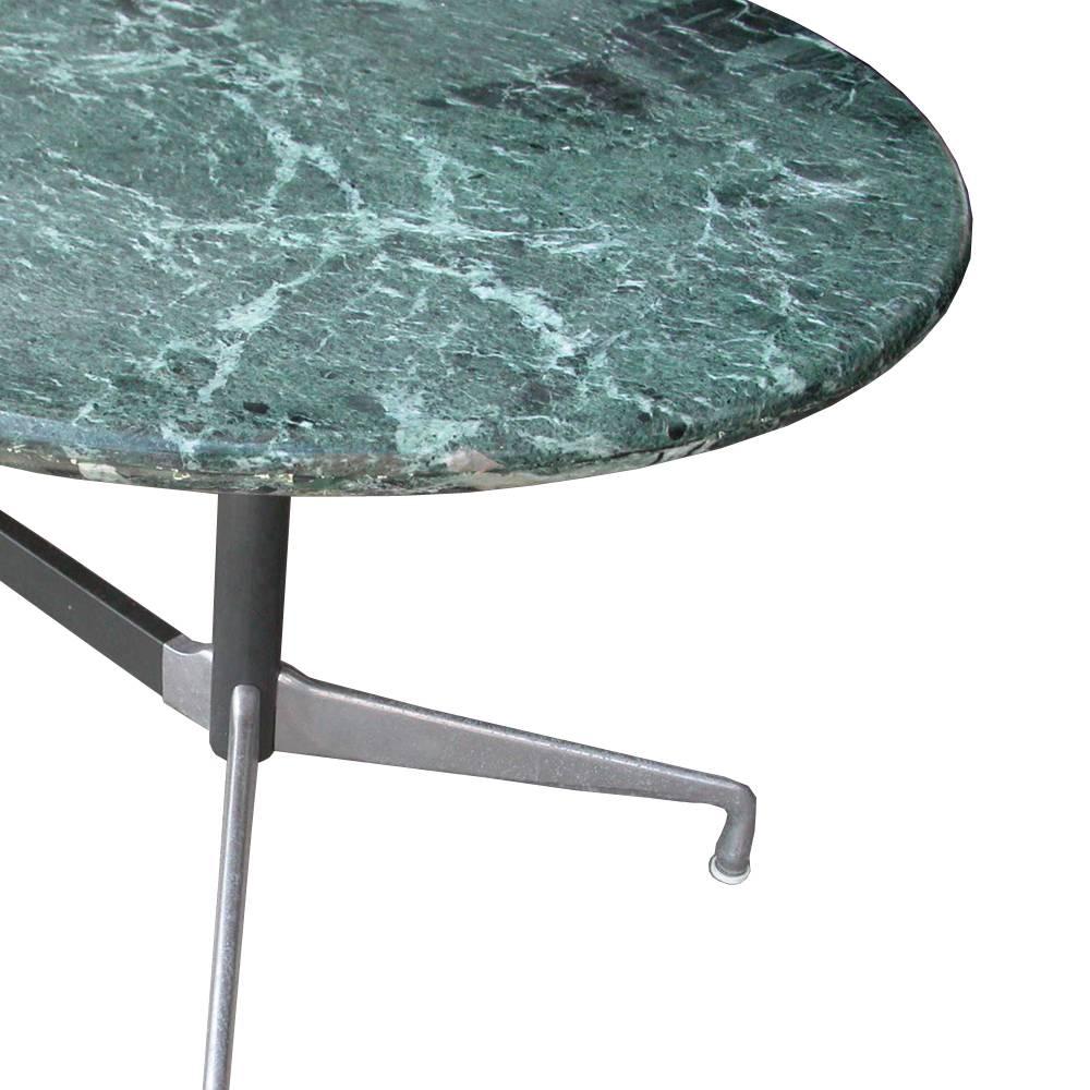 7 ft Italian Verde green marble-top with a Herman Miller Eames Base 
 
Classic and elegant segmented H base with 1.5