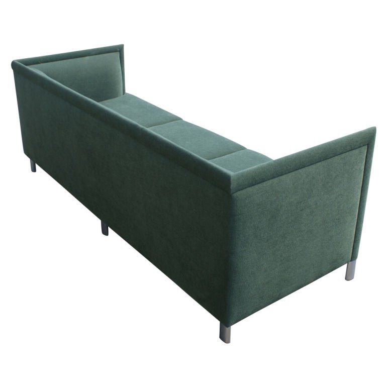 A Mid-Century Modern sofa designed by Gary Lee and made by Knoll. Green bouclé upholstery and aluminium legs. Eco-friendly materials and construction. We have two of these sofas available.