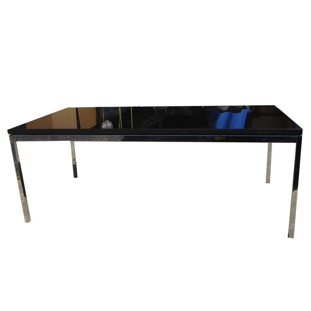 Vintage Florence Knoll Chrome base coffee table with top in Granite 
According to Knoll, "consistent with all of her designs, the table has a spare, geometric presence that reflects the objective perfectionism and rational design approach