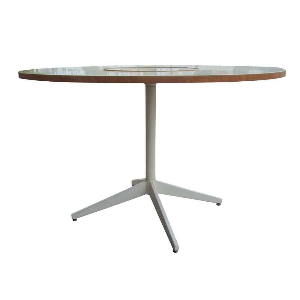 Vintage George Nelson Lazy Susan dining table for Herman Miller. This is a pistachio green table, featuring a Lazy Susan at its center. A stylish dining table for a kitchen or dining room.
ONE DAY SALE ONLY: GEORGE NELSON LAZY SUSAN DINING TABLE