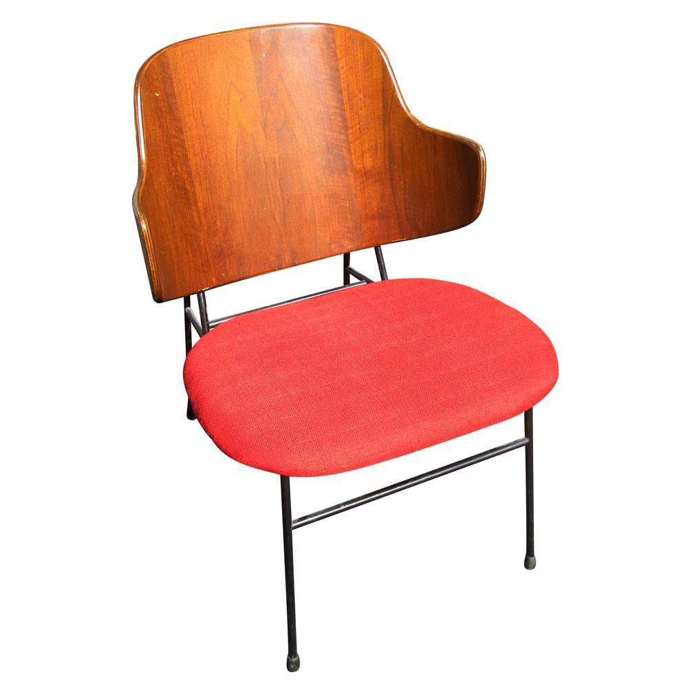 Vintage mid century Ib Kofod-Larsen penguin chair 
Sculpted wood back chair supported by an black iron reclining base. 
Two available, one red fabric and one turquoise fabric
Price is per chair
Circa 1950s 
Make in Denmark