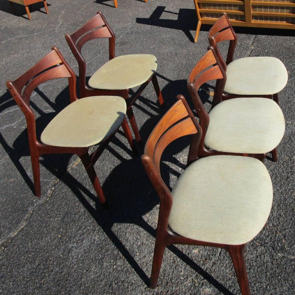 Vintage mid century five Rosewood Danish dining chairs by Erick Buch
Beautiful rosewood frame, fabric upholstered seat.
Sculpted back design giving more comfort 
Made in Denmark